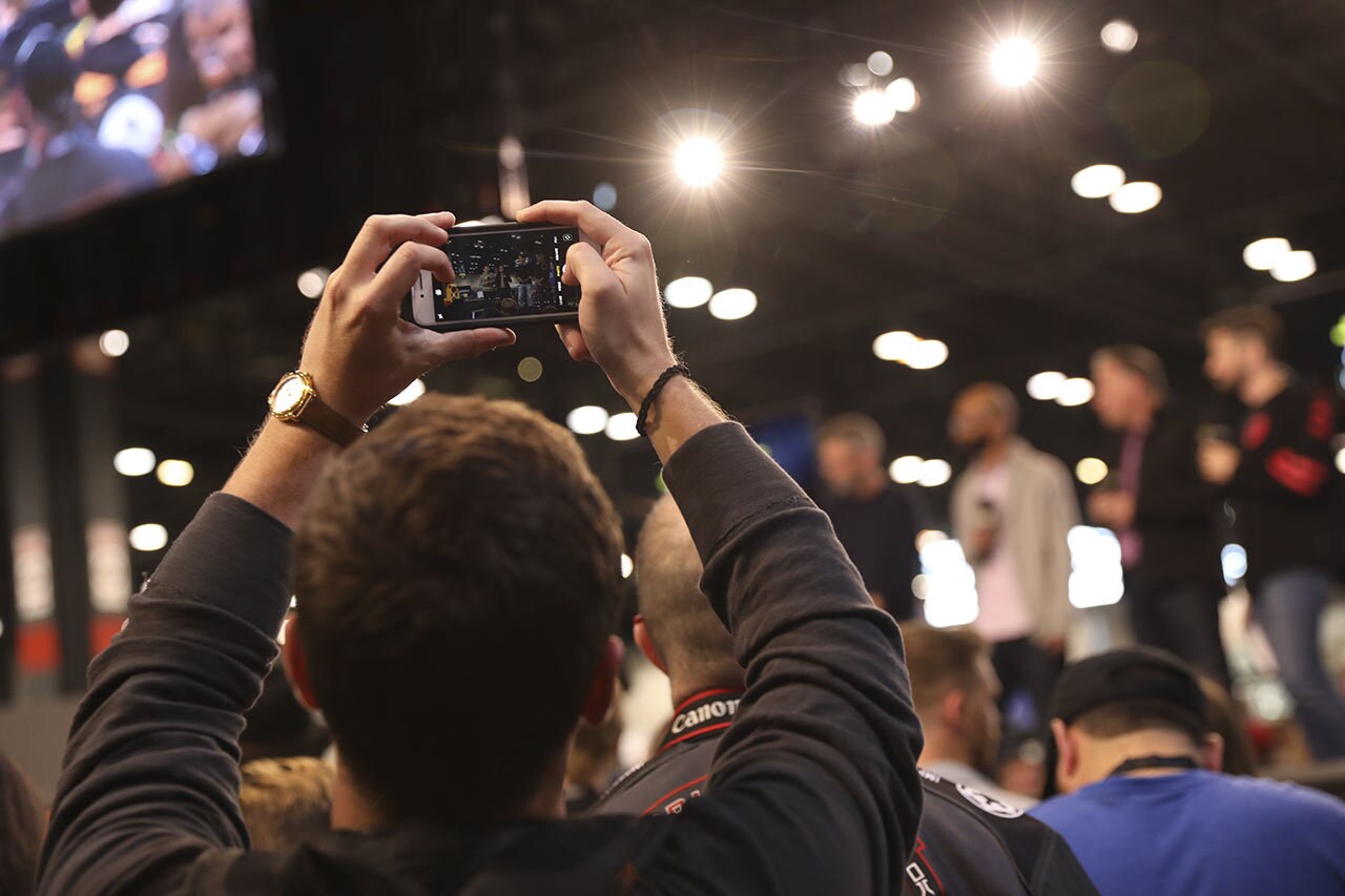 A fan taking a photo of the stage at Celebrations Chicago 2019