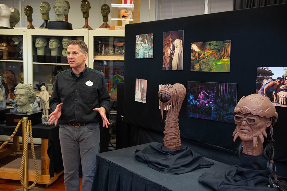 Imagineer presenting story of Hondo Ohnakain in sculpture studio