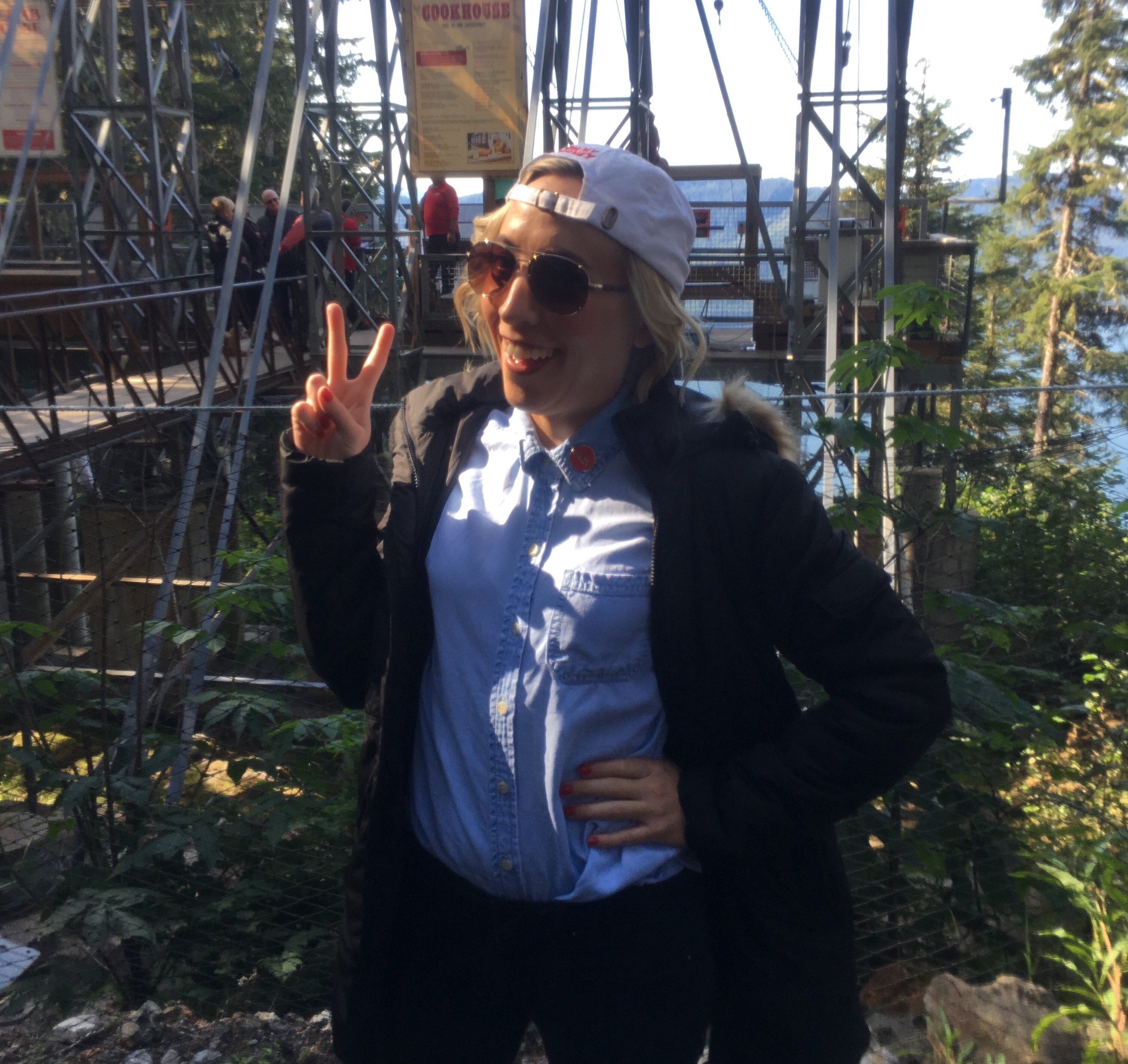 Oh My Disney Host Michelle Lema in front of the Icy Strait Point Zipline on the Disney Wonder Alaska Cruise