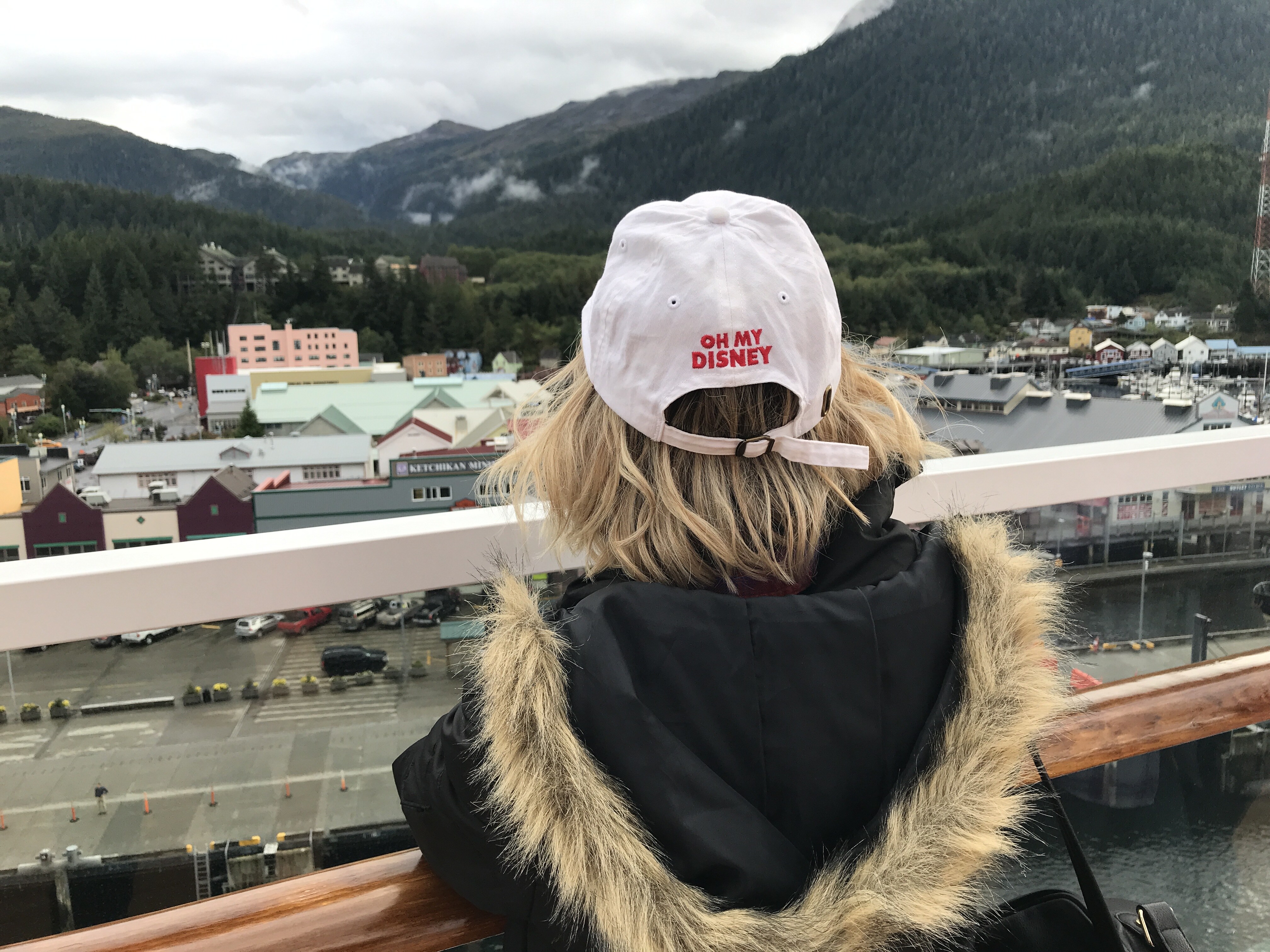 View of Ketchikan From the Disney Wonder Deck on the Disney Alaska Cruise with Host Wearing Oh My Disney Hat