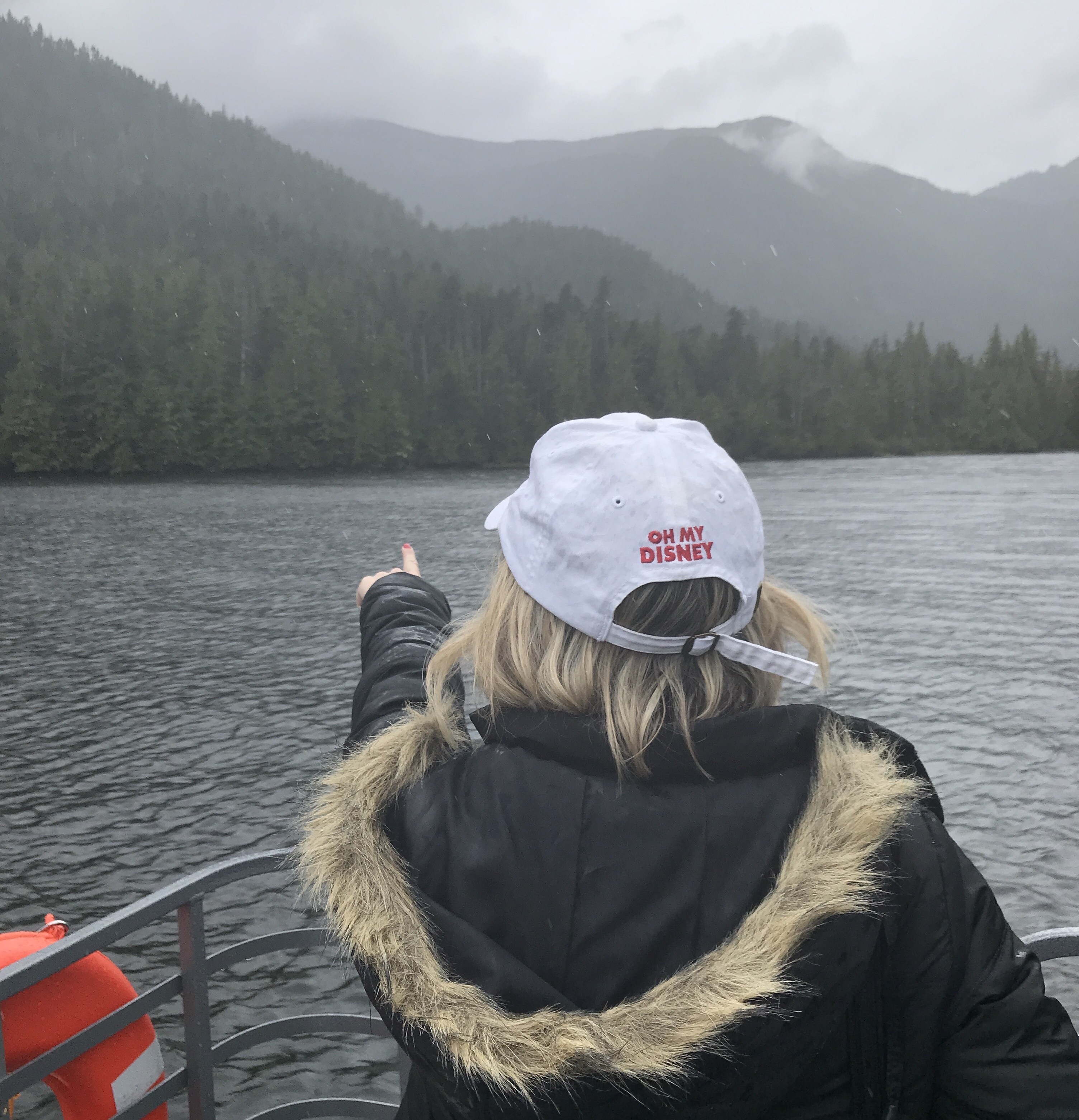 Ketchikan Boat Excursion on Disney Wonder Alaska Cruise with Host Wearing Oh My Disney Hat