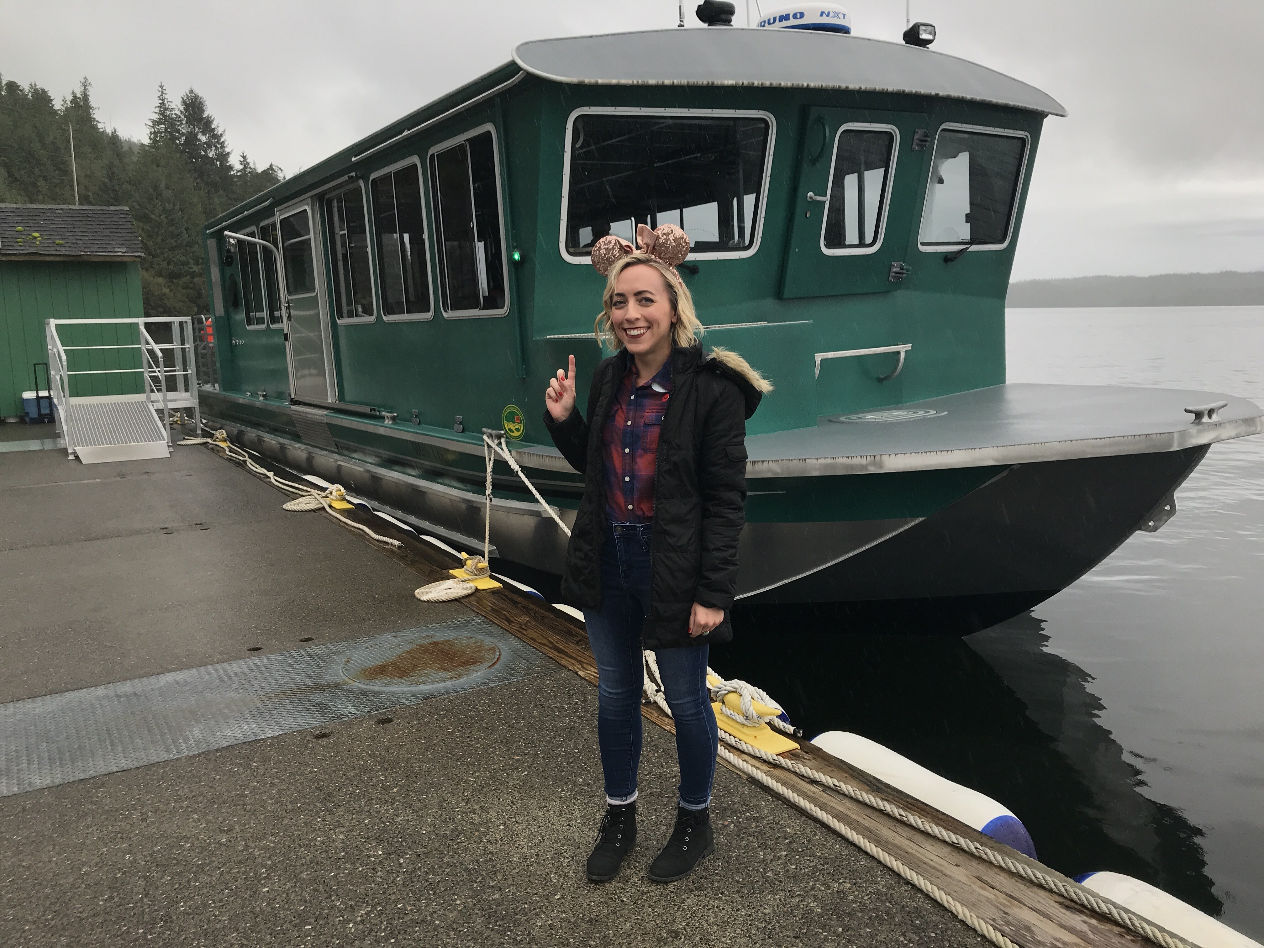 Oh My Disney Host Michelle Lema in front of Ketchikan Boat Excursion on the Disney Wonder Alaska Cruise