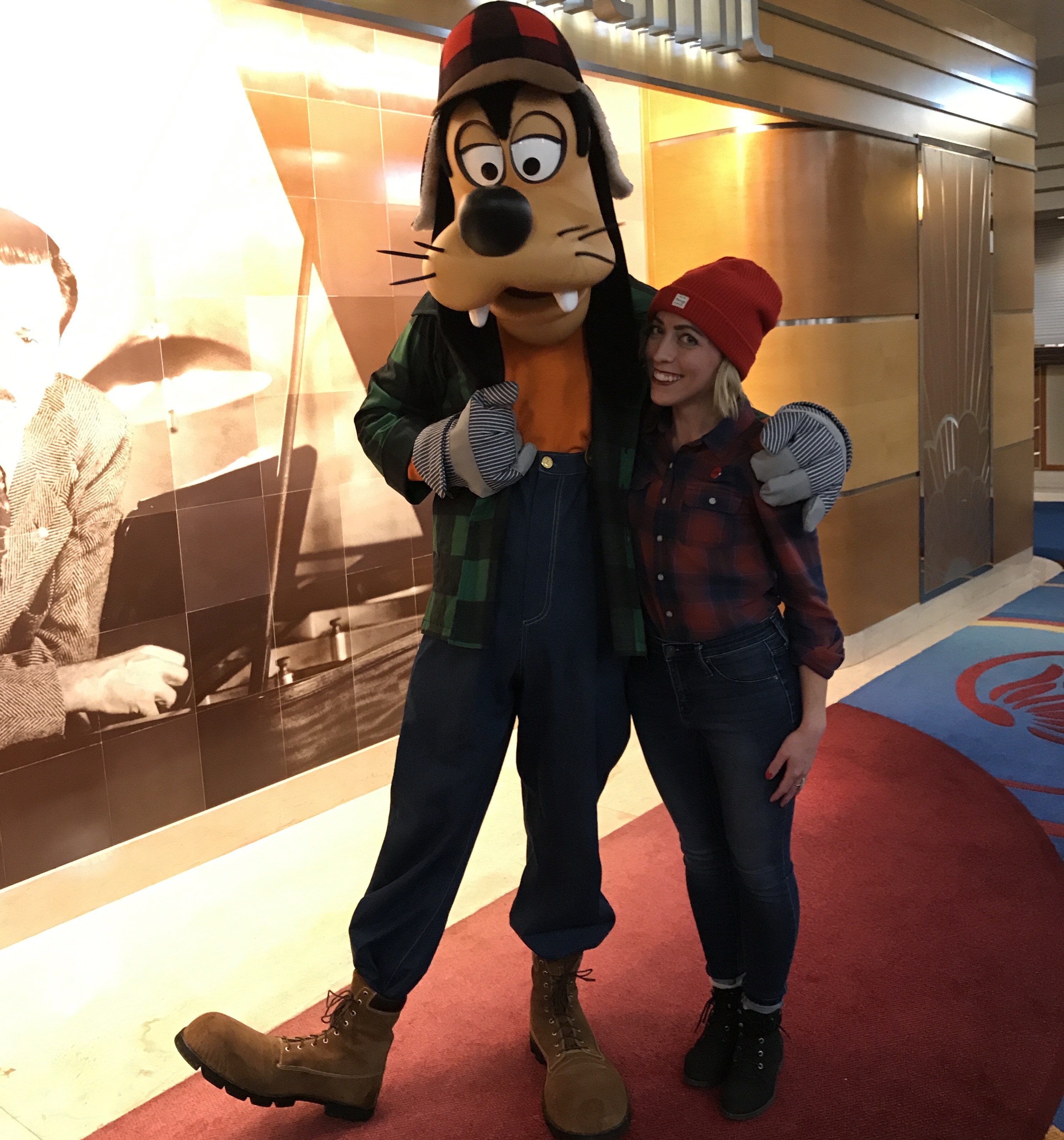 Lumberjack Goofy and Oh My Disney Host Michelle Lema on the Disney Wonder