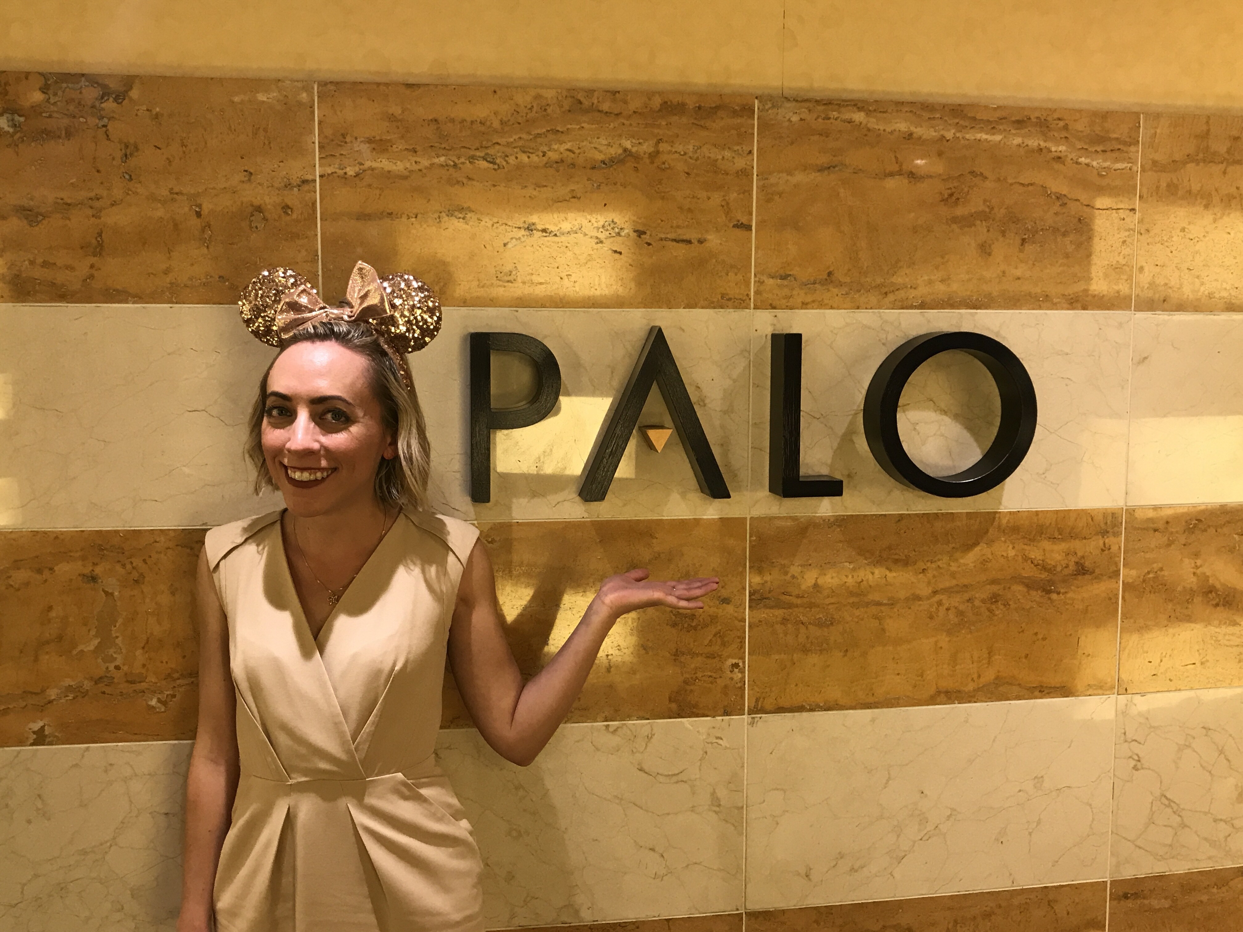 Palo Restaurant sign on the Disney Wonder with Oh My Disney Host Michelle Lema