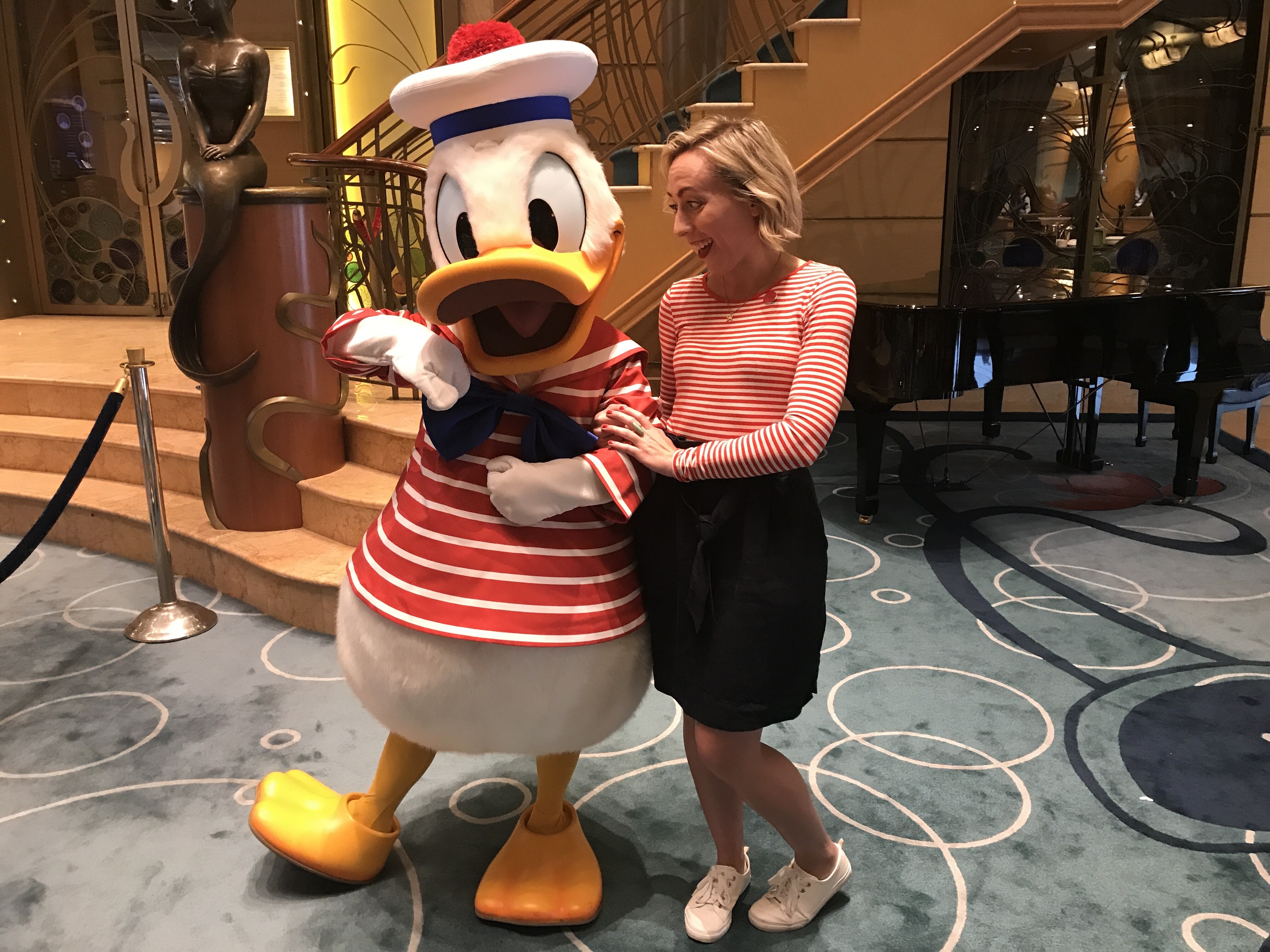 Donald Duck in Cruise Wear and Oh My Disney Host Michelle Lema on the Disney Wonder