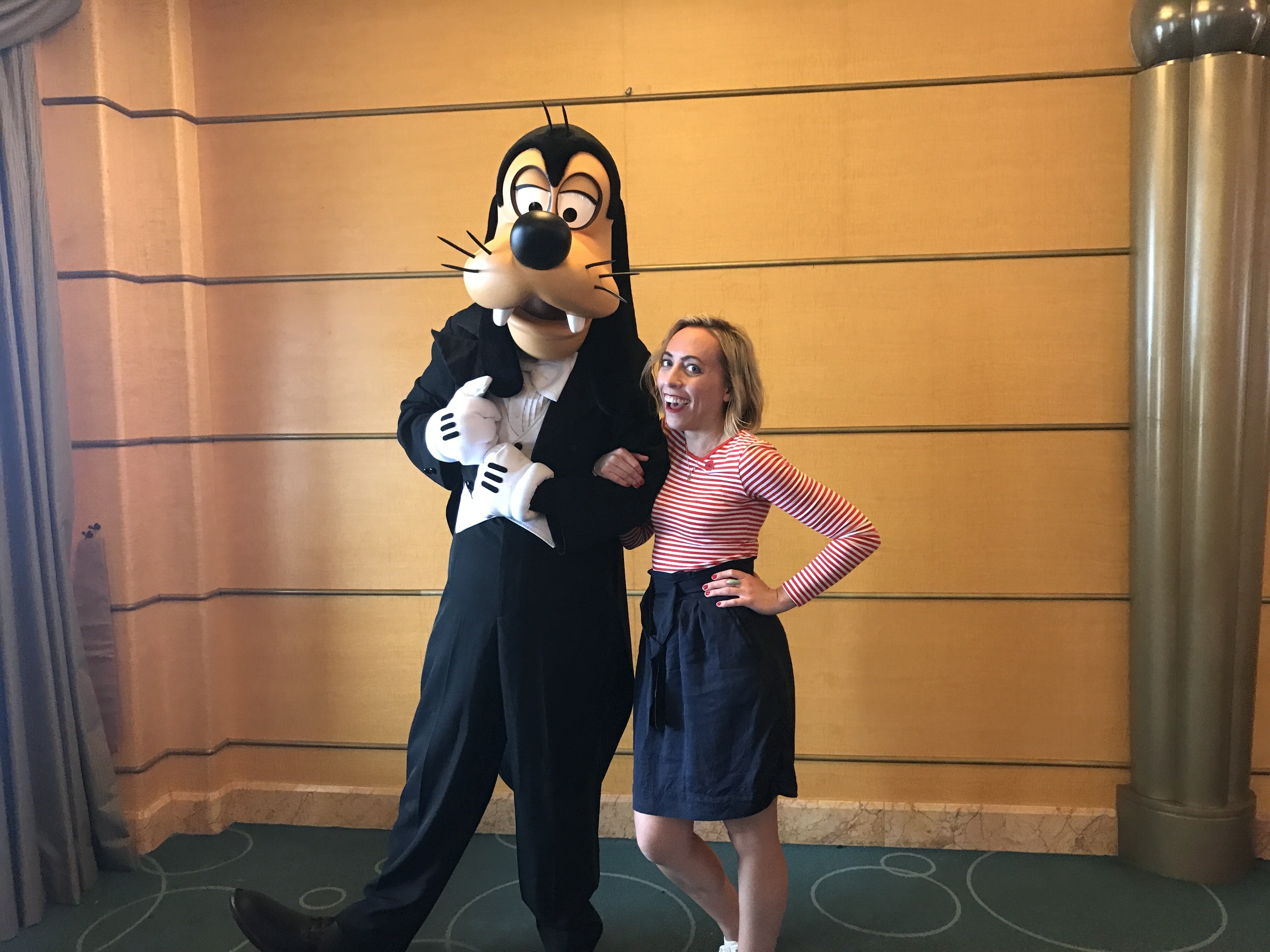 Goofy in Formal Wear and Oh My Disney Host Michelle Lema