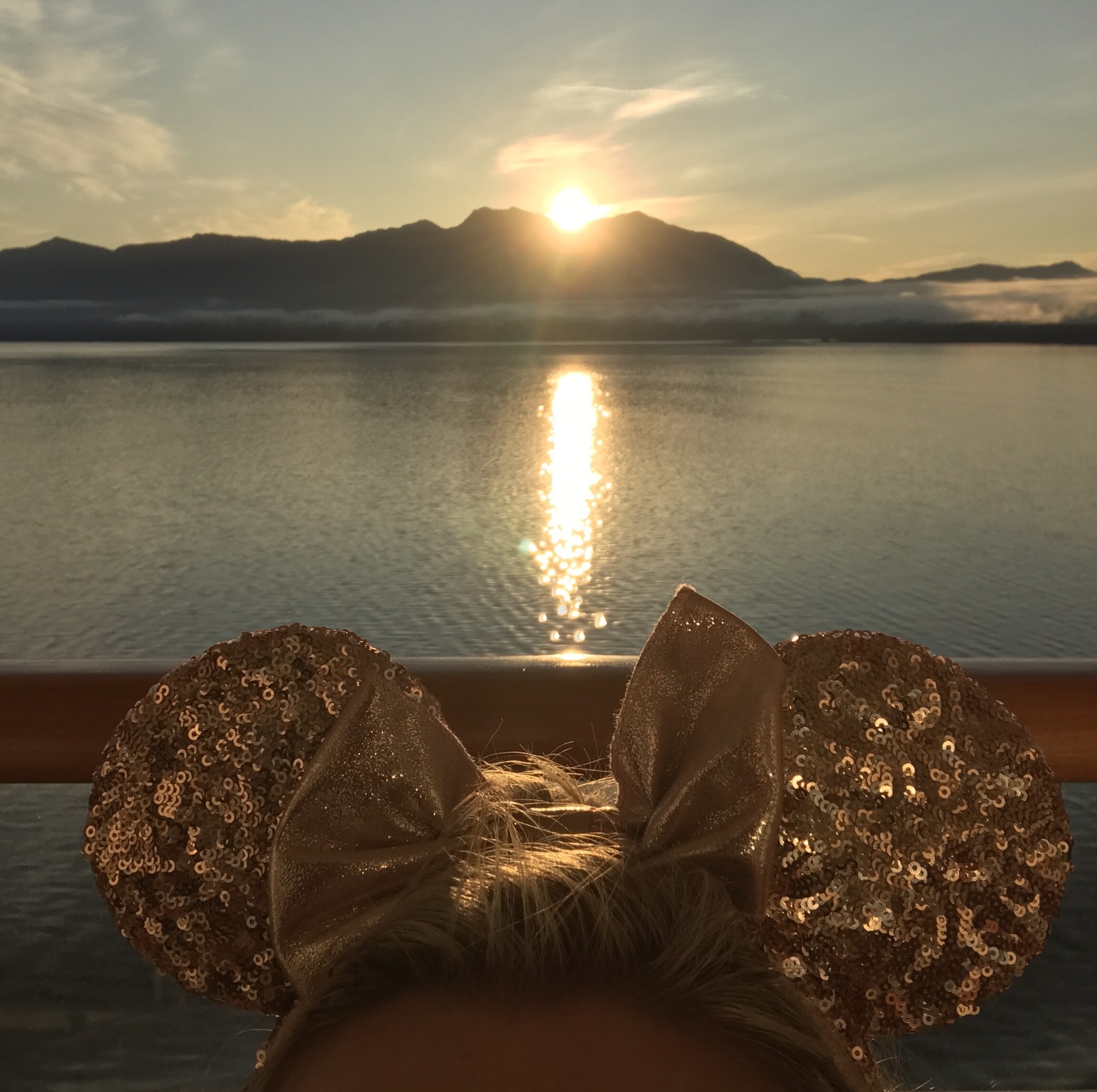 Minnie Mouse Ears Looking over Ocean Sunset on the Disney Wonder