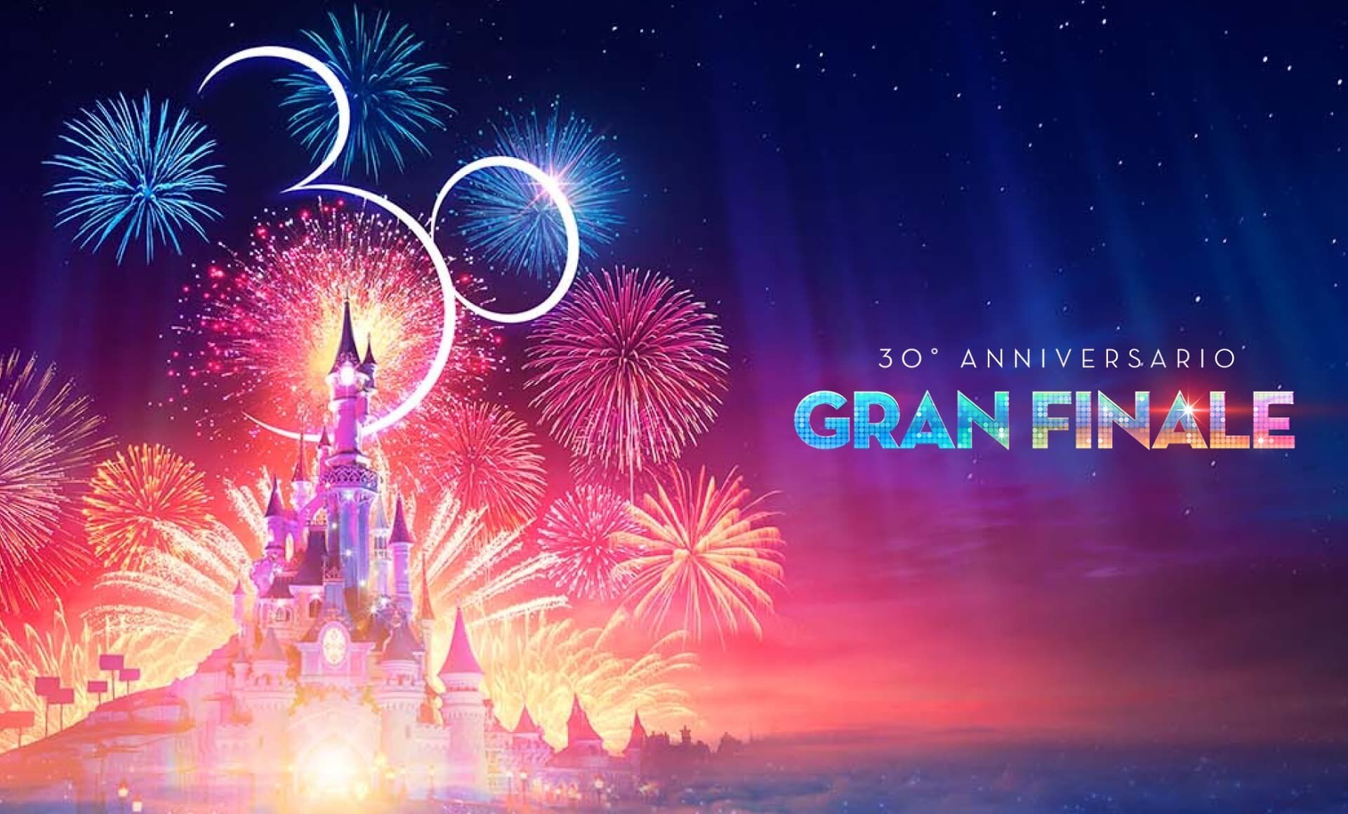 Castello di Disneyland Paris al tramonto con fuochi artificiali e logo 30° anniversario "Gran Finale"