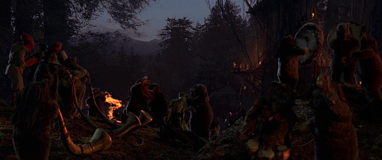 Ewoks sing the celebration song.