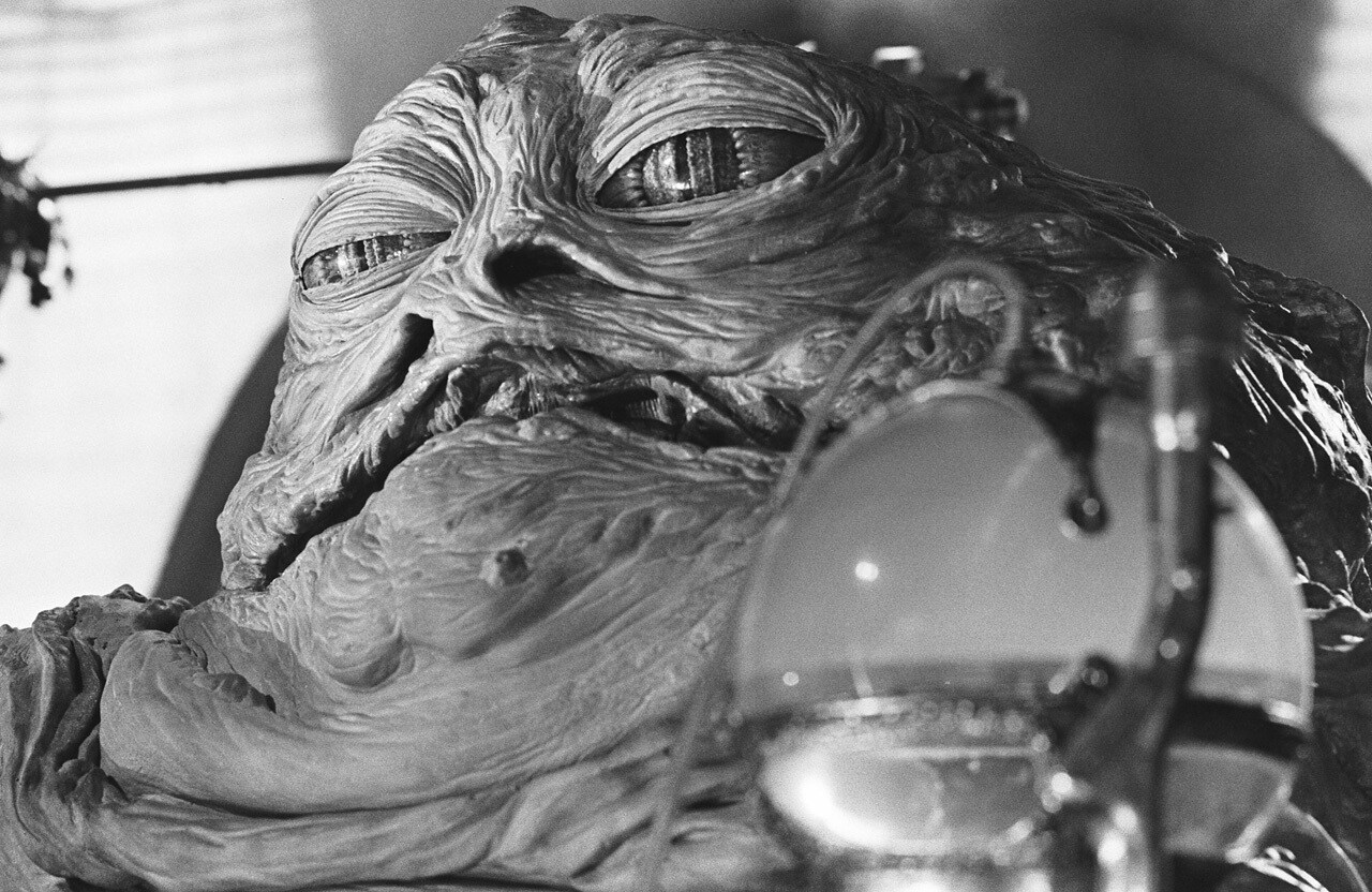 A black and white image of Jabba the Hutt