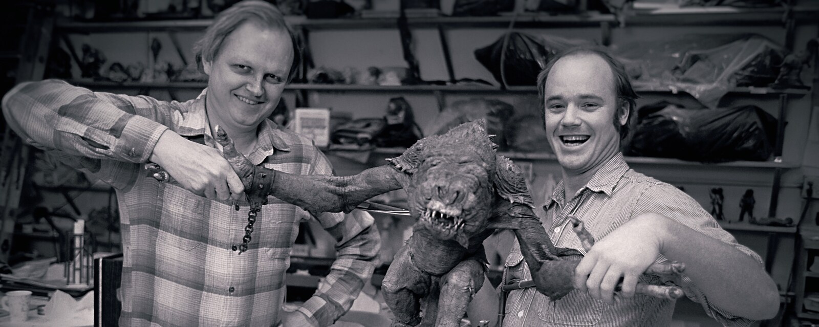 Dennis Muren and Phil Tippett with a rancor puppet