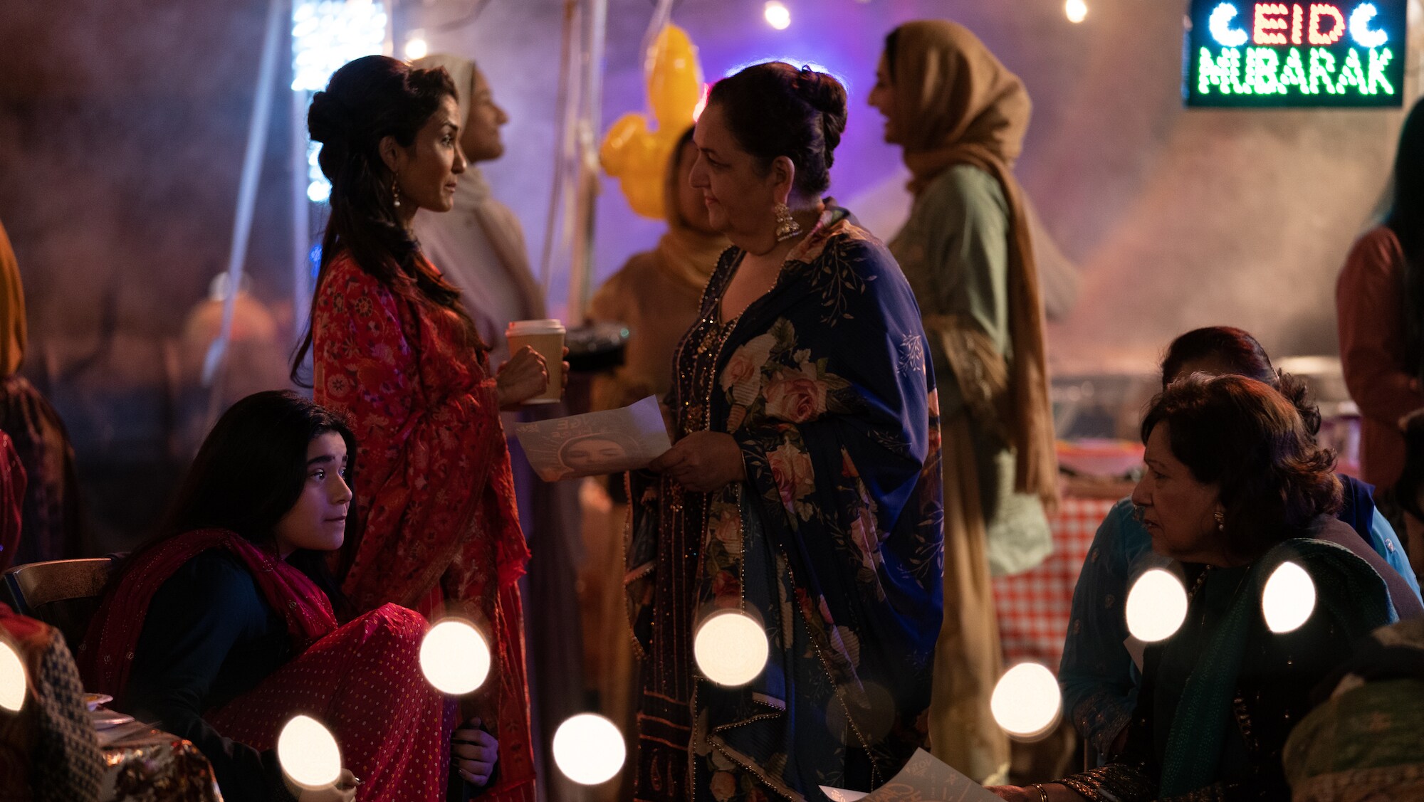 (L-R): Iman Vellani as Ms. Marvel/Kamala Khan, Anjali Bhimani as Auntie Ruby, and Sophia Mahmud as Auntie Zara in Marvel Studios' MS. MARVEL, exclusively on Disney+. Photo by Daniel McFadden. ©Marvel Studios 2022. All Rights Reserved.