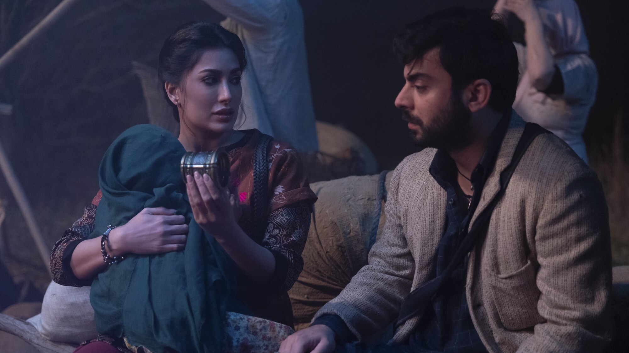 (L-R): Mehwish Hayat as Aisha and Fawad Kahn as Hasan in Marvel Studios' MS. MARVEL, exclusively on Disney+. Photo by Chuck Zlotnick. ©Marvel Studios 2022. All Rights Reserved.