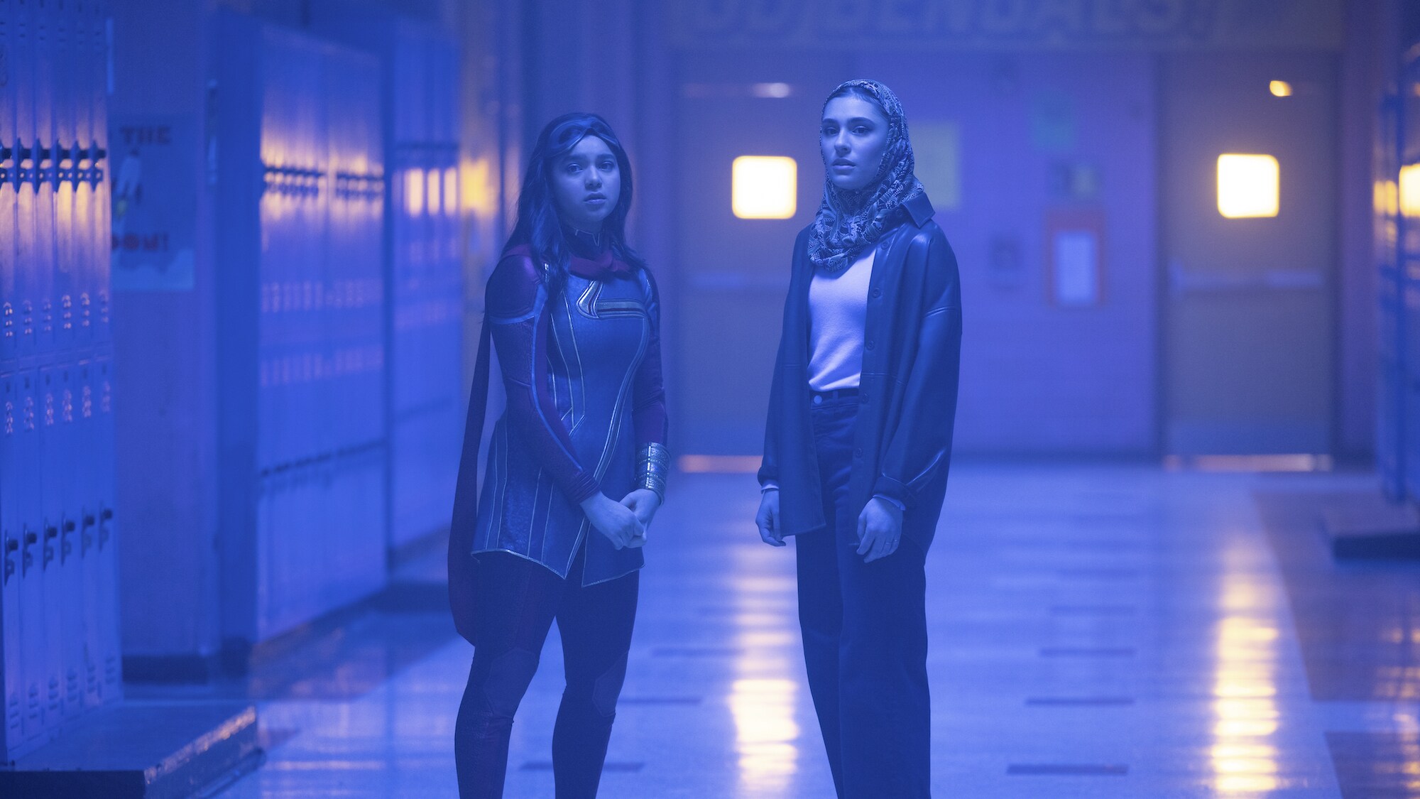 (L-R): Iman Vellani as Kamala Khan/Ms. Marvel and Yasmine Fletcher as Nakia in Marvel Studios' MS. MARVEL, exclusively on Disney+. Photo by Chuck Zlotnick. ©Marvel Studios 2022. All Rights Reserved.