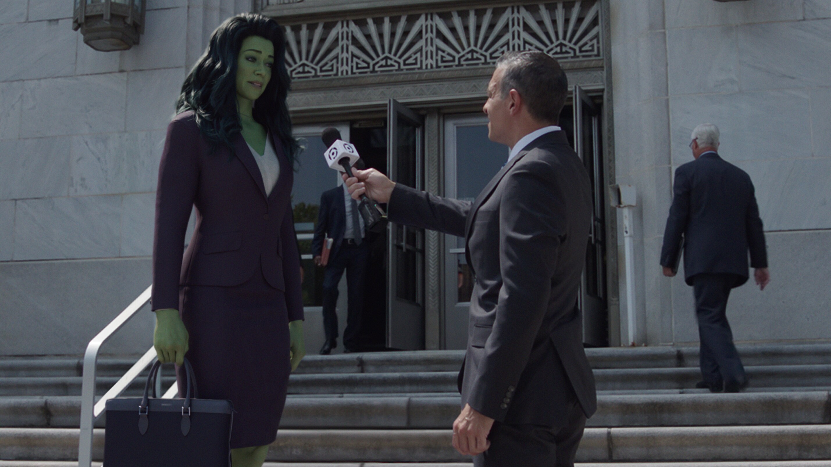 (Left): Tatiana Maslany as Jennifer "Jen" Walters/She-Hulk in Marvel Studios' She-Hulk: Attorney at Law, exclusively on Disney+. Photo courtesy of Marvel Studios. © 2022 MARVEL.