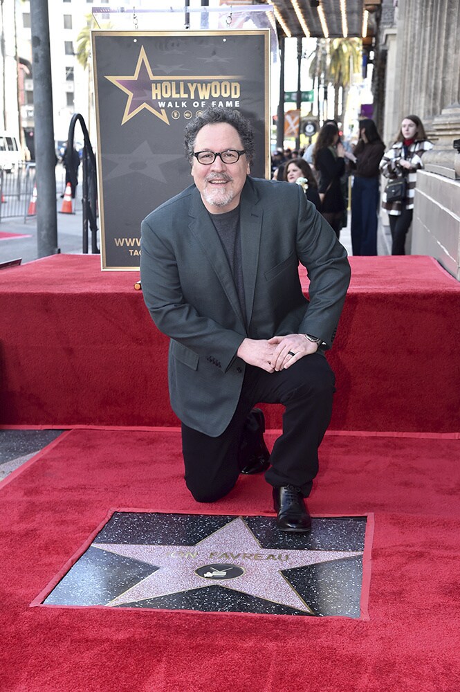 Jon Favreau kneeling with his star