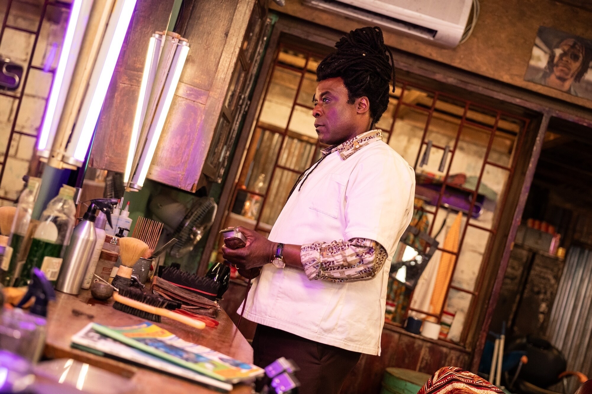 Picture Shows: Barber (Ariyon Bakare) James Pardon/BBC Studios/Disney/Bad Wolf