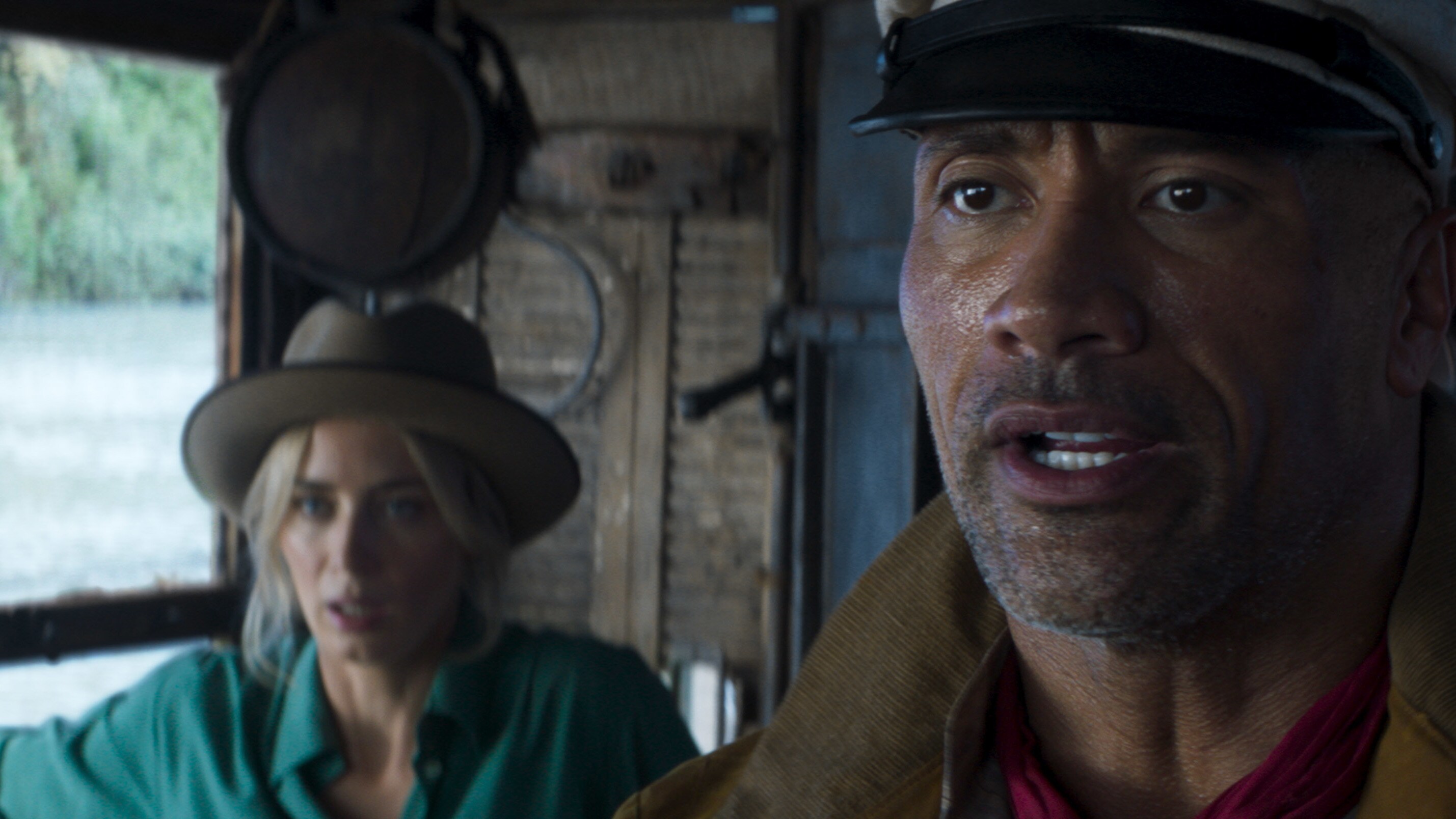 Emily Blunt as Lily Houghton and Dwayne Johnson as Frank Wolff in Disney’s JUNGLE CRUISE. Photo courtesy of Disney. © 2021 Disney Enterprises, Inc. All Rights Reserved.