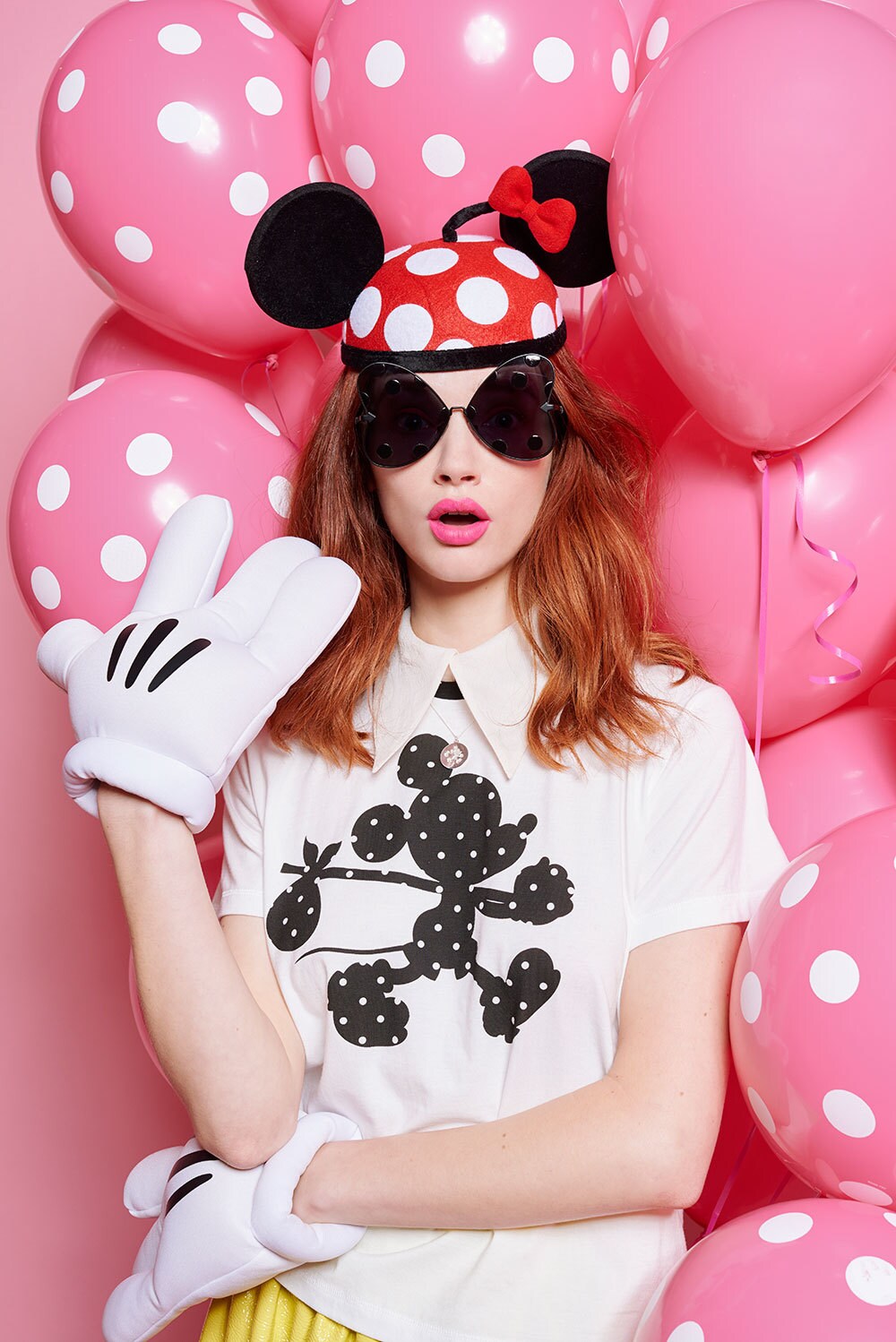 Model wearing products from the limited edition Disney x Karen Walker collection 