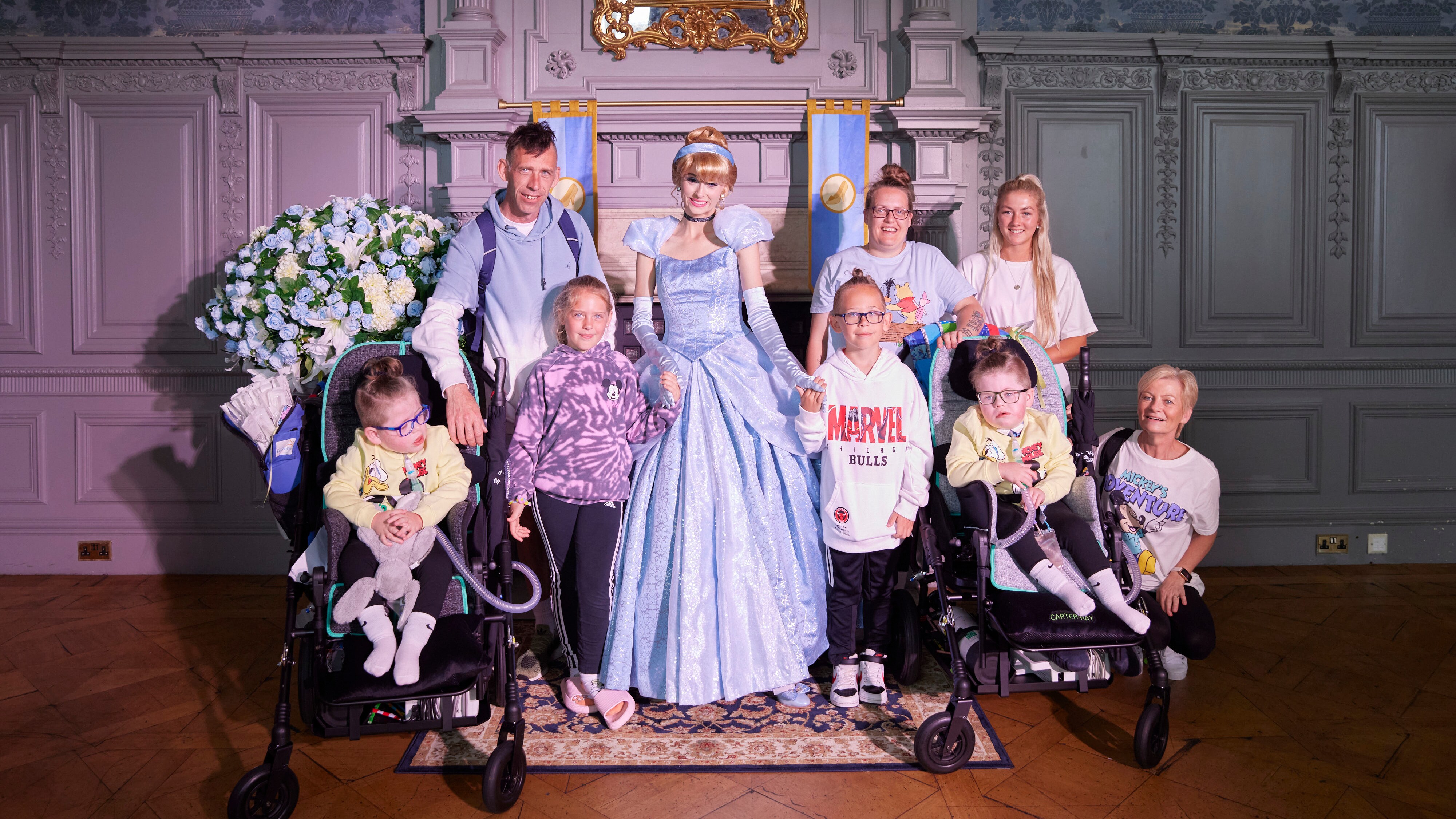 Family posing with Cinderella 