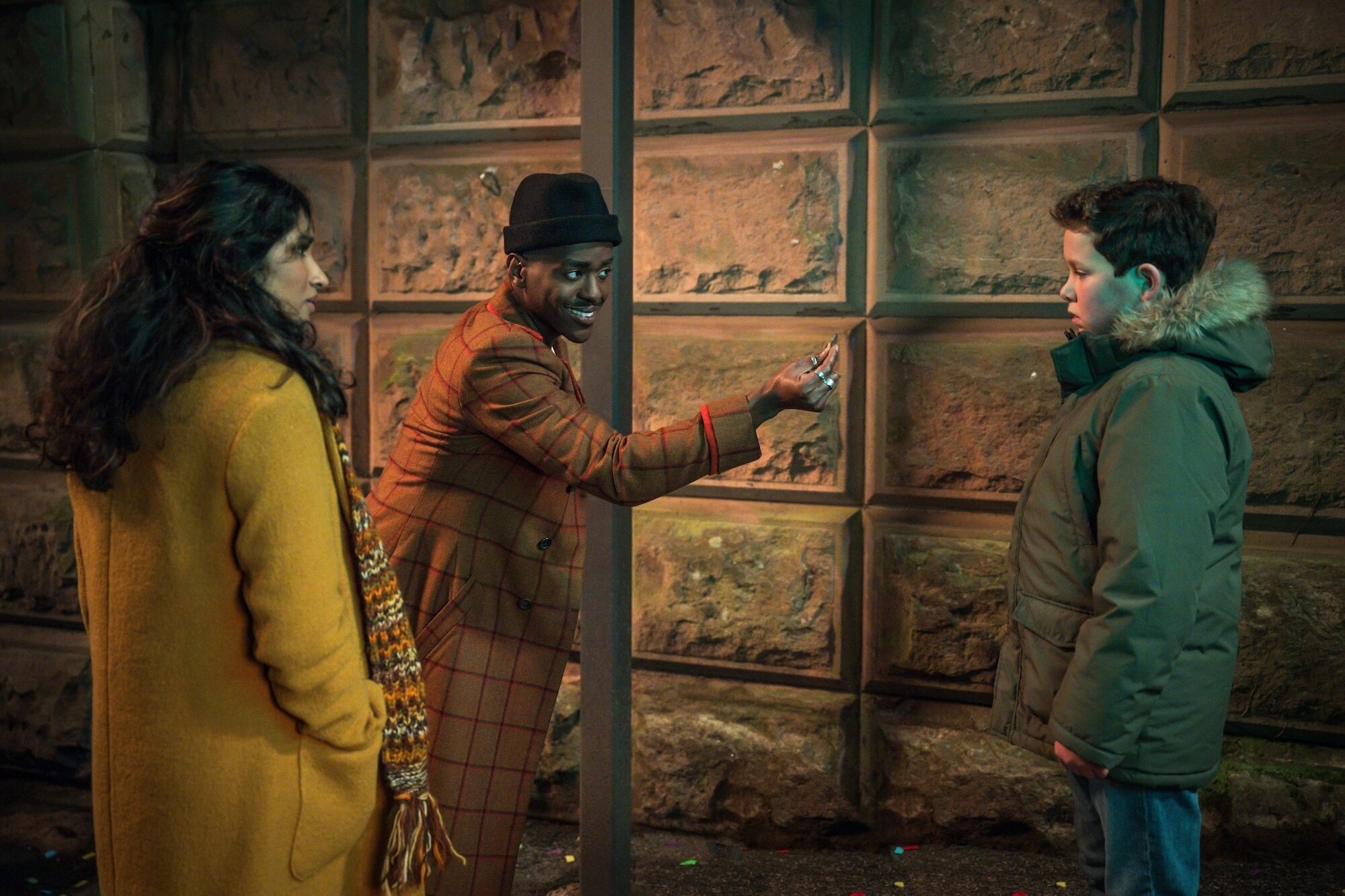 Picture Shows: Belinda Chandra (Varada Sethu) The Doctor (Ncuti Gatwa) Young Conrad (Benjamin Chivers) Lara Cornell/BBC Studios/Disney/Bad Wolf