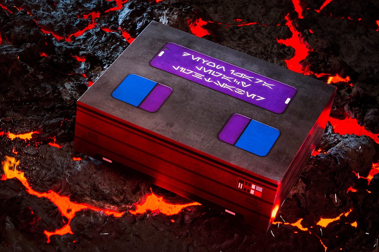 A lifestyle image of Devon Izara’s Legacy lightsaber collectible box.