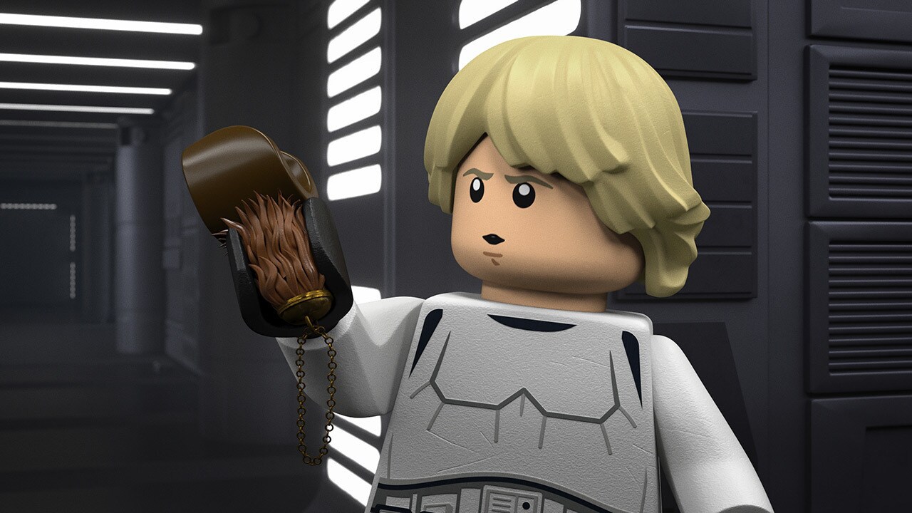 Luke Skywalker holding a Wookiee's paw in LEGO Star Wars: Terrifying Tales (2021).