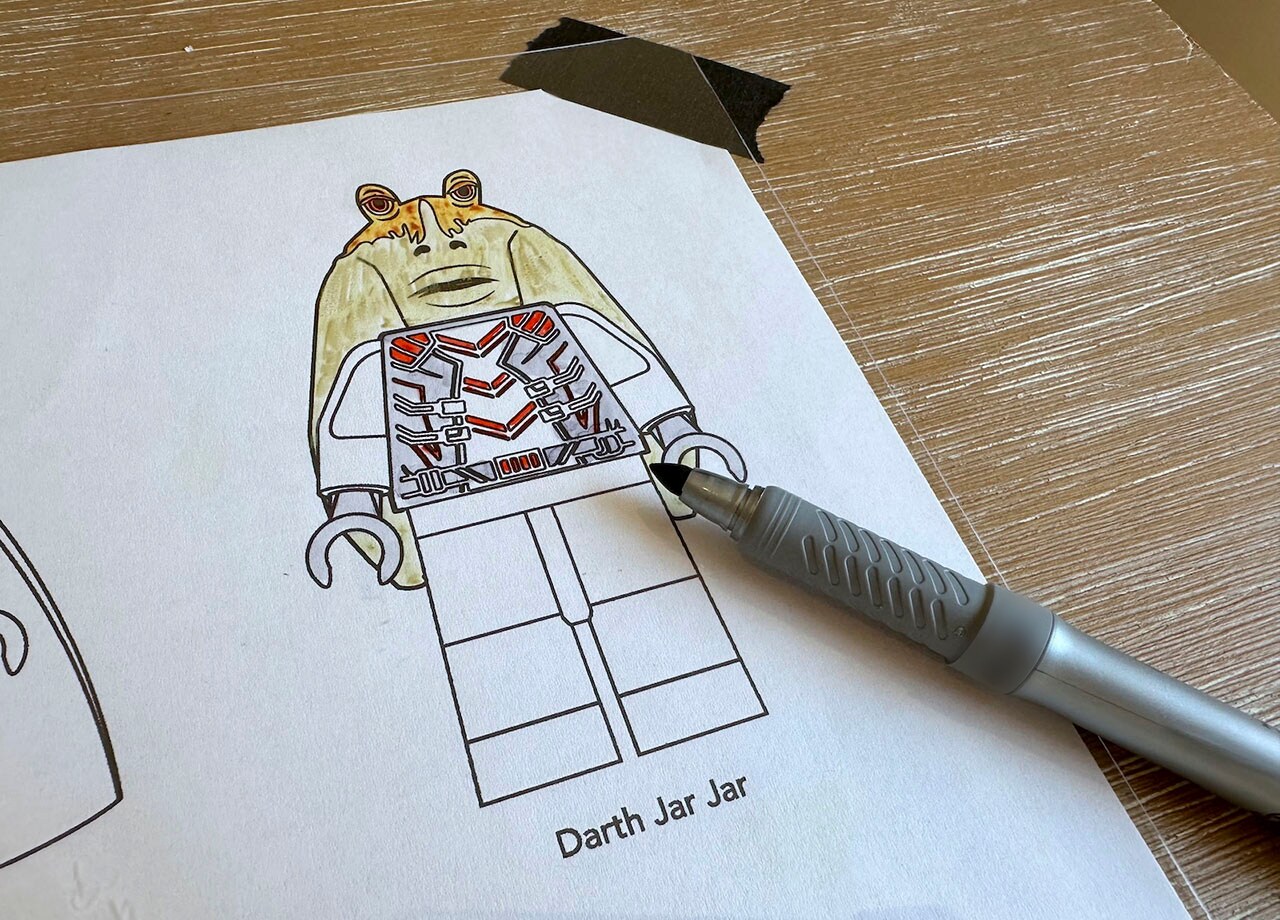 Darth Shrinky Binks - Step 2: Starting with color permanent markers, fill in the blank areas of the LEGO characters.