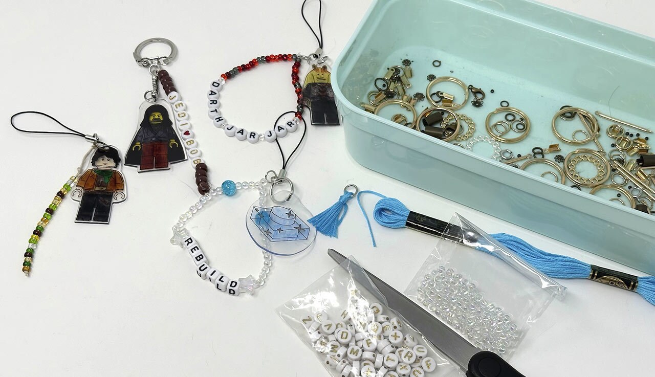 Darth Shrinky Binks - Step 9: Personalize your new creation! Use string, embroidery thread, colorful beads, and letter beads to add the character’s name. Combine it with other charms or try out other creative ideas!