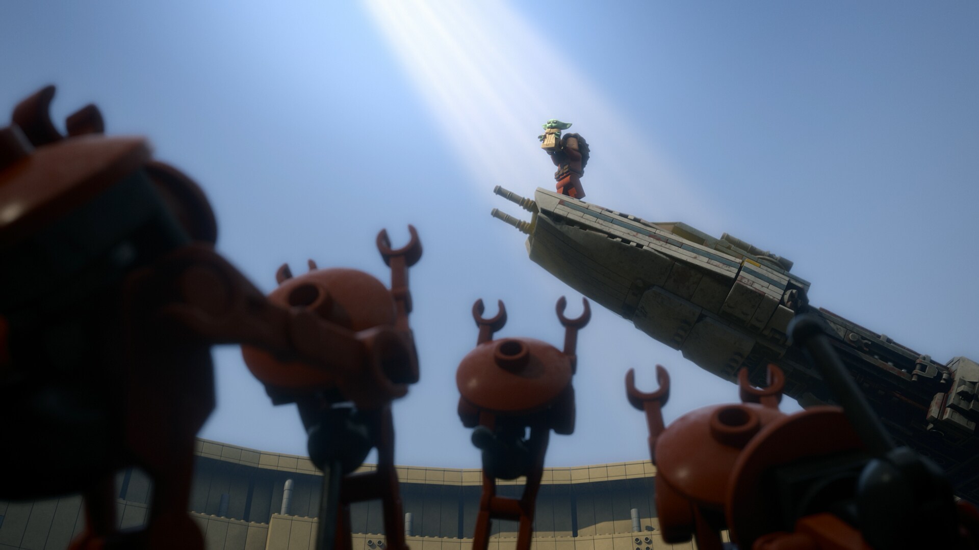 Peli hoists Grogu in a grandiose gesture.