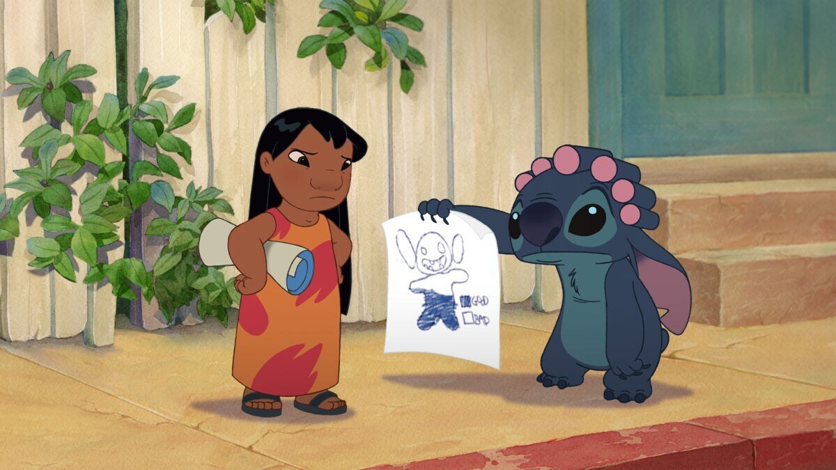 Stitch showing Lilo a drawing in the animated movie "Lilo & Stitch 2: Stitch has a Glitch"