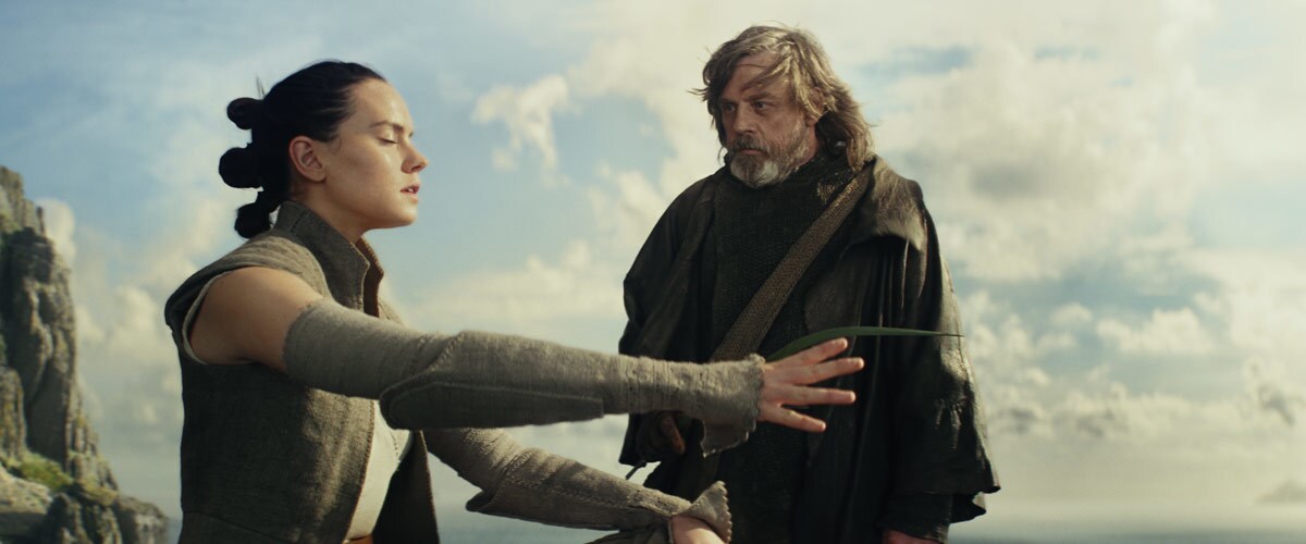 Luke Skywalker training Rey in the ways of the Force on Ahch-To