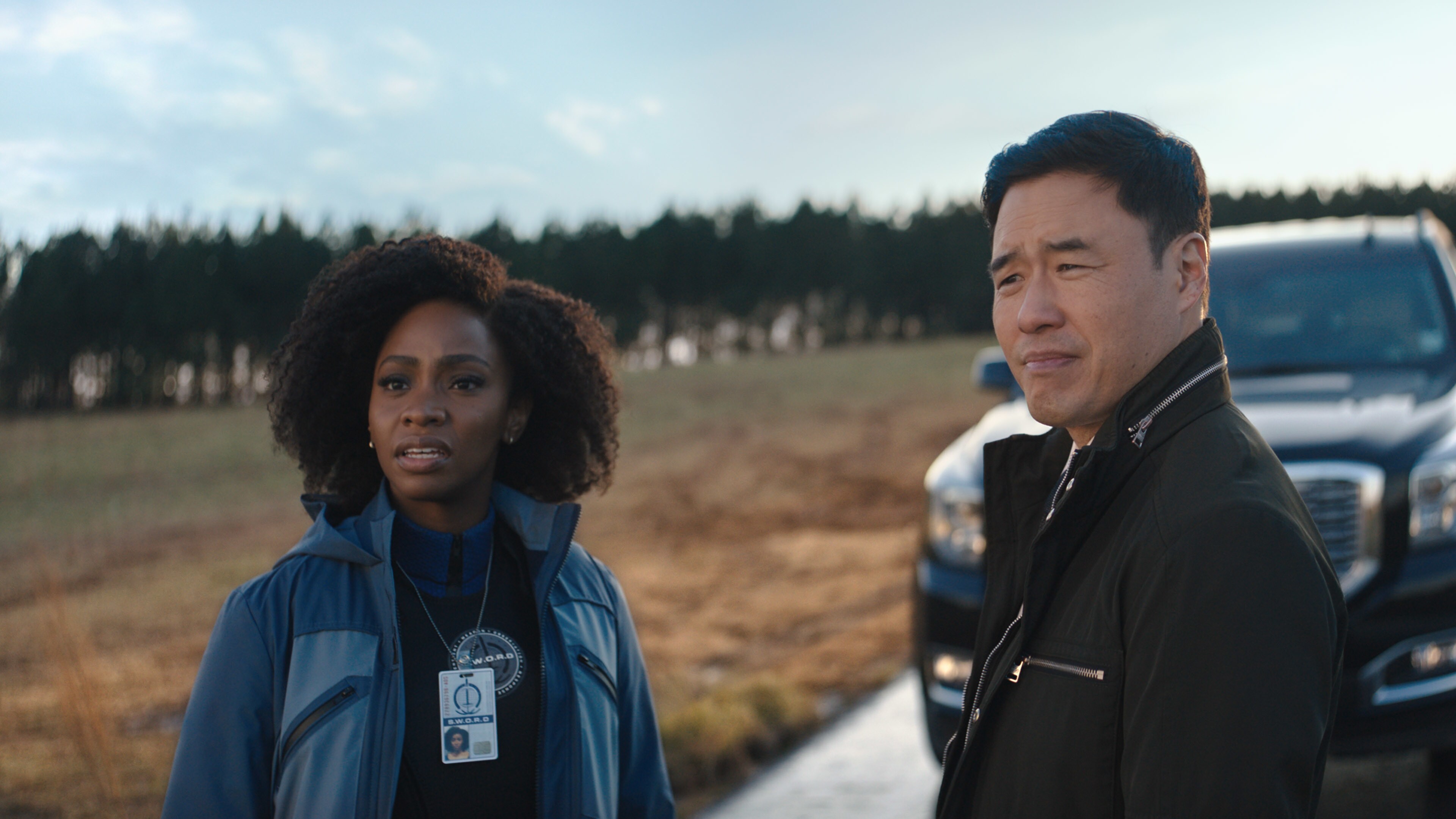 (L-R): Teyonah Parris as Monica Rambeau and Randall Park as Jimmy Woo in Marvel Studios' WANDAVISION exclusively on Disney+. Photo courtesy of Marvel Studios. ©Marvel Studios 2021. All Rights Reserved.