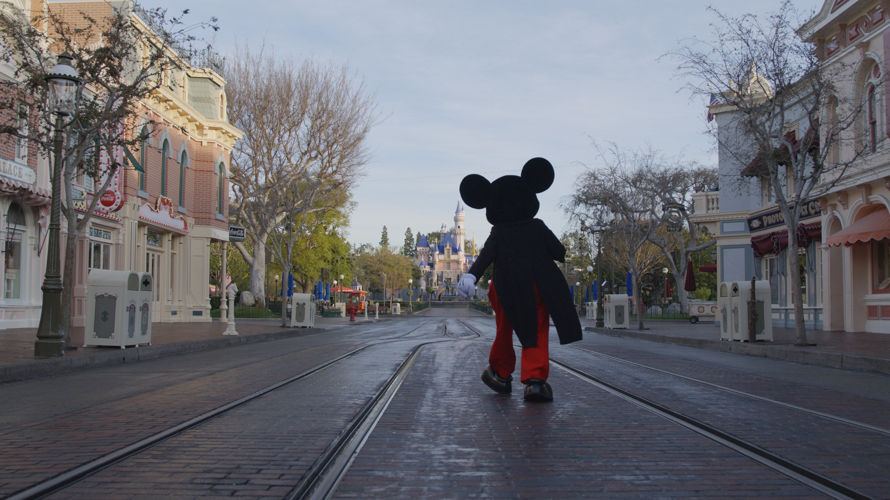 Mickey walks down Main Street USA at Disneyland. (Credit: Mortimer Productions)
