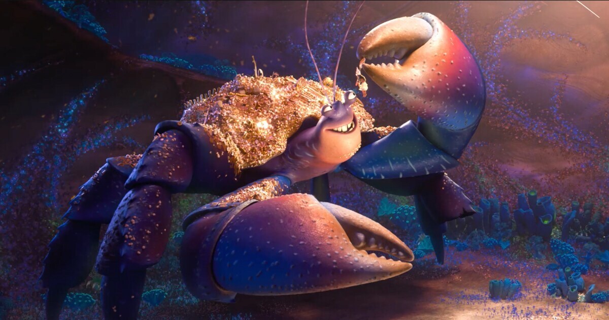 Animated character Tamatoa holding gold treasure from the film "Moana"