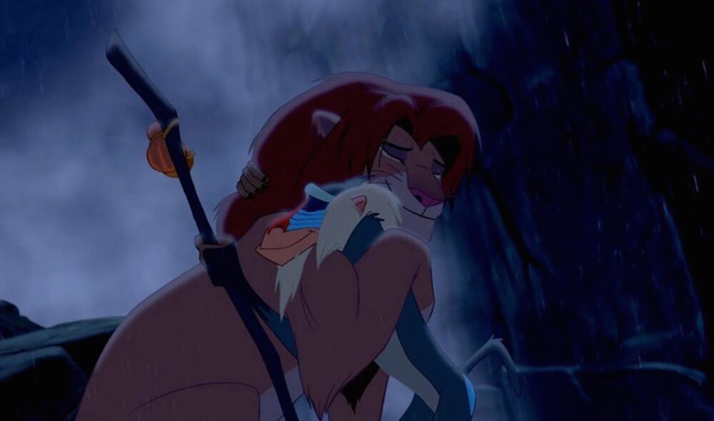 Animated characters Simba (lion) and Rafiki (baboon) hugging