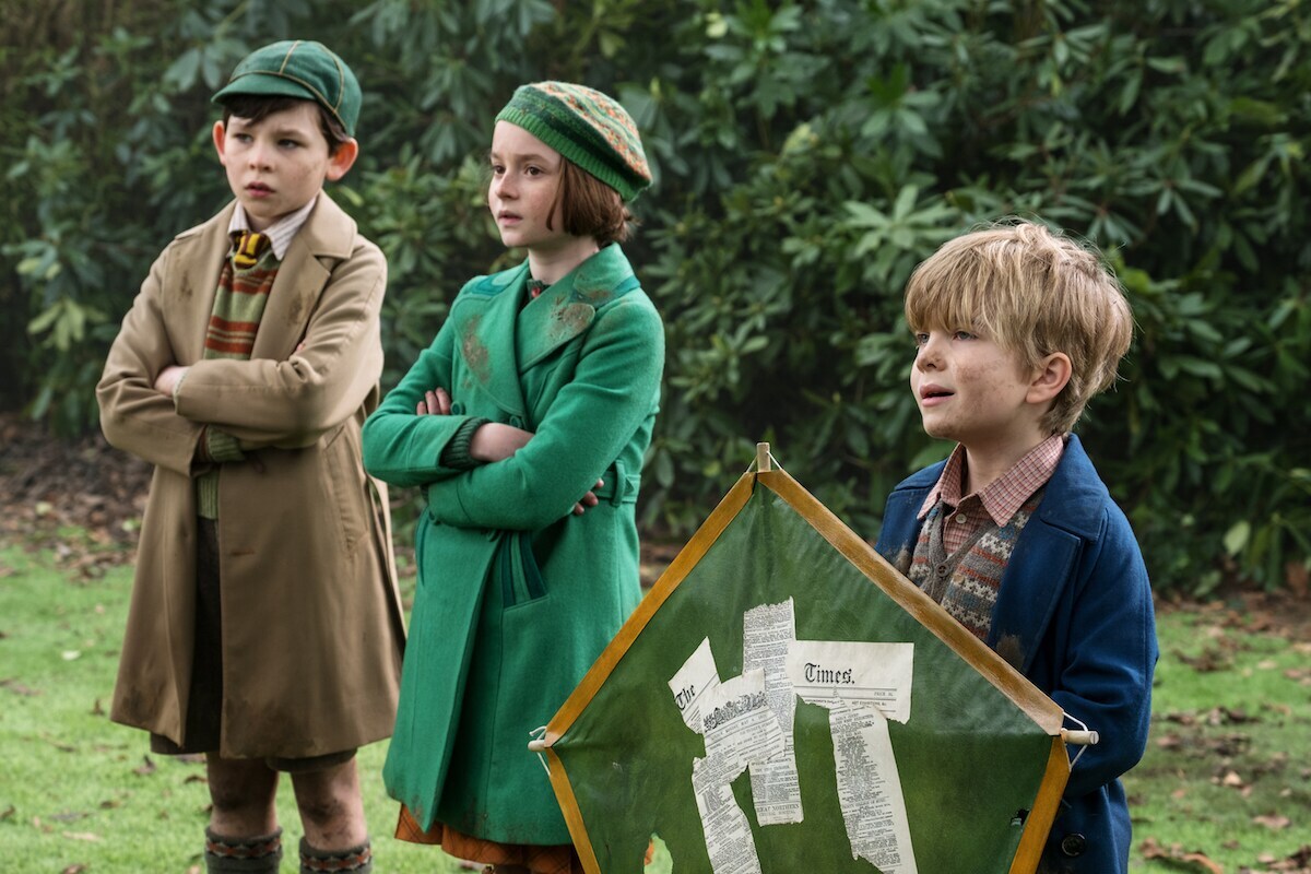 John, Annabel, and Georgie in the park with a green kite
