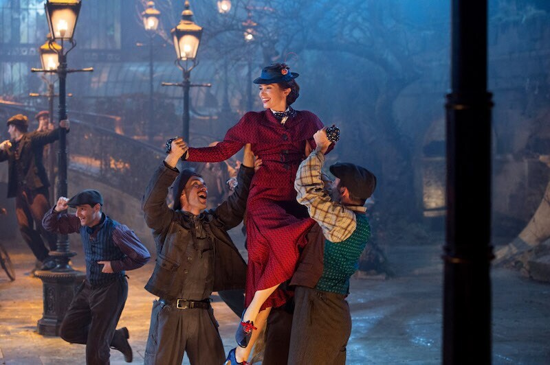 Men holding up Mary Poppins
