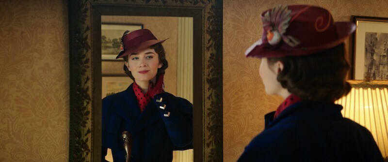 Marry Poppins looking at reflection in mirror