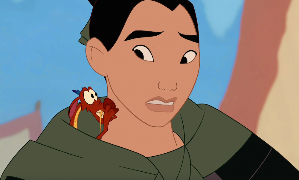 Mushu whispering in Mulan's ear in the animated movie "Mulan"