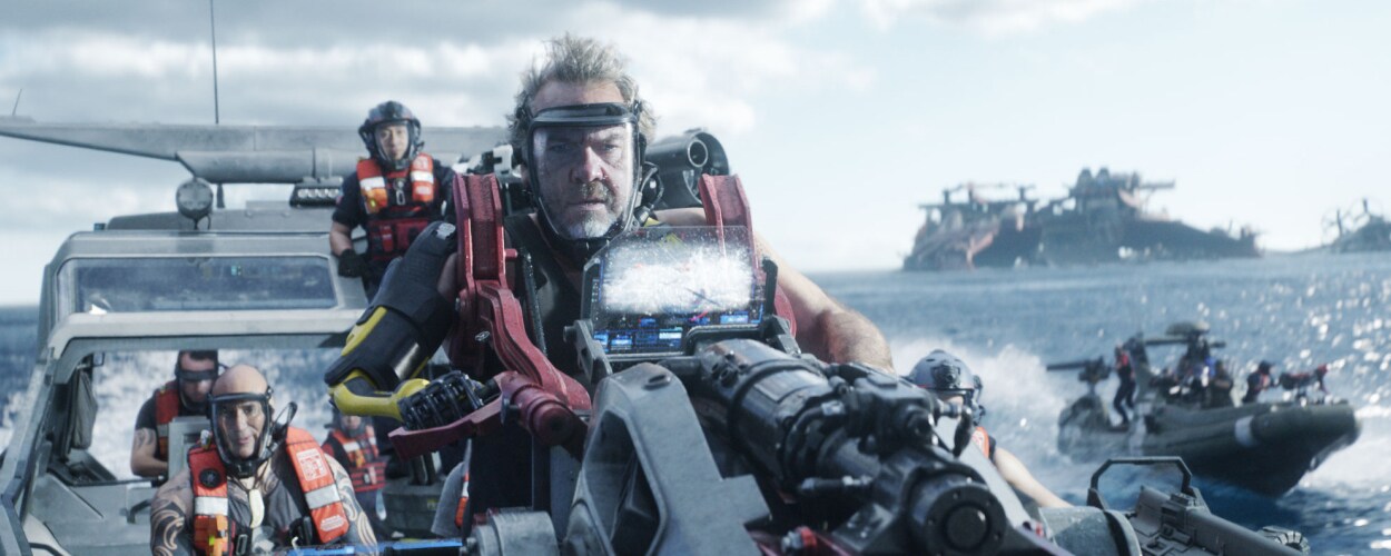 Captain Mick Scoresby takes the helm of a boat.