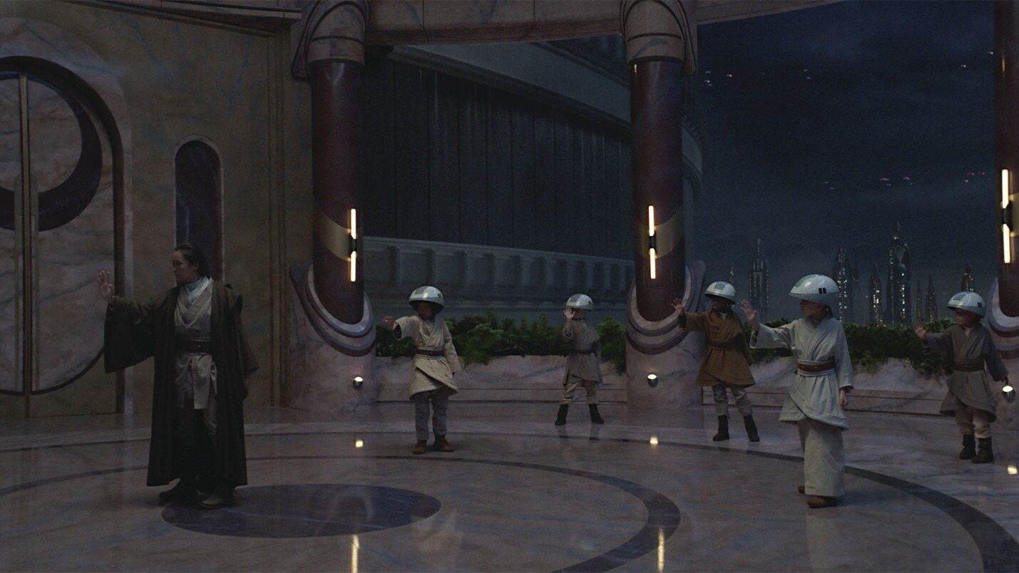 On a pleasant Coruscant evening, a Jedi Master instructs younglings on a balcony of the Jedi Temp...