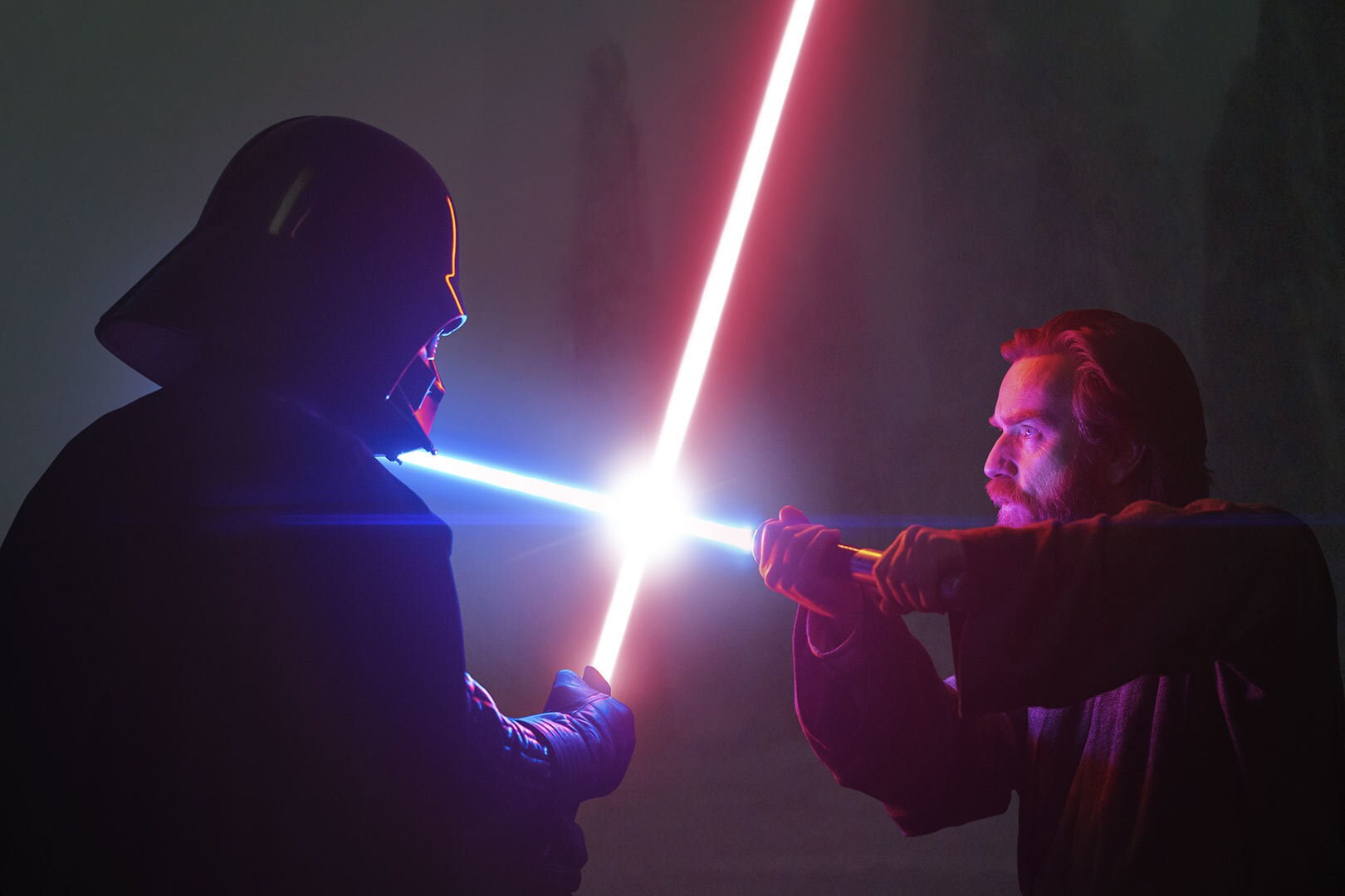 Darth Vader and Obi-Wan Kenobi dueling on a barren moon