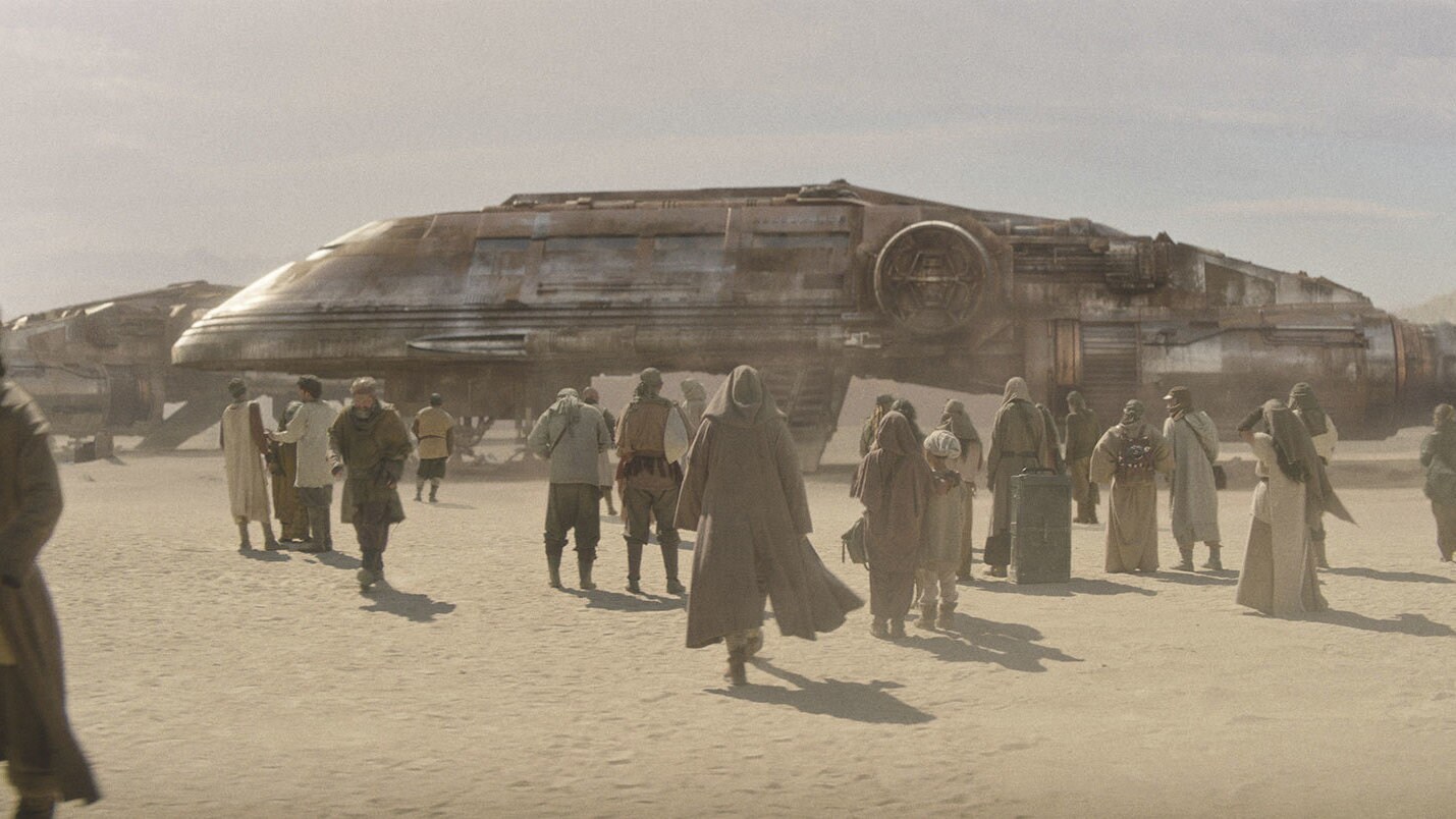 Obi-Wan returns to town and makes his way to a commercial vessel. Lightsaber hidden beneath his c...