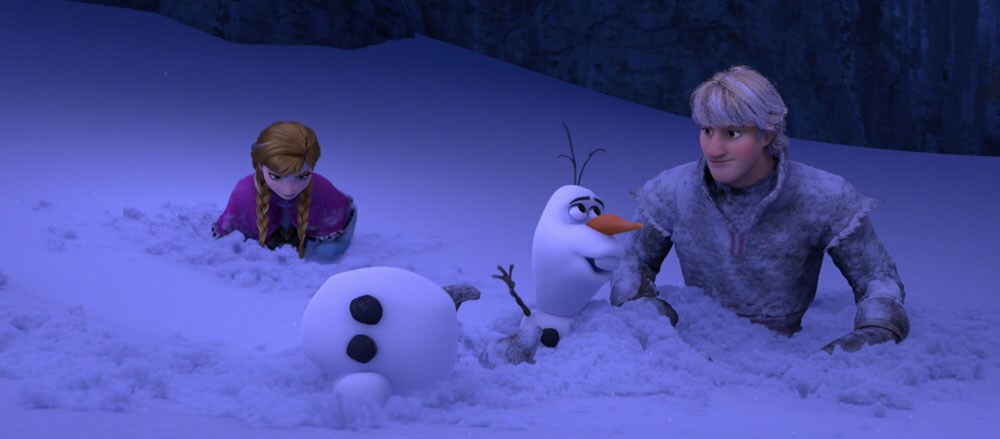 Animated characters Olaf (snowman), Kristoff and Anna in the snow from the film 