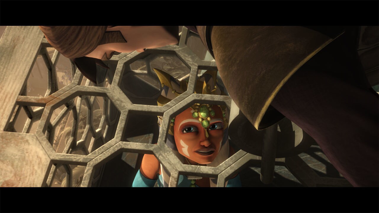Anakin frees Ahsoka from her cage. He gives her his comlink and sends her to their ship, the capt...