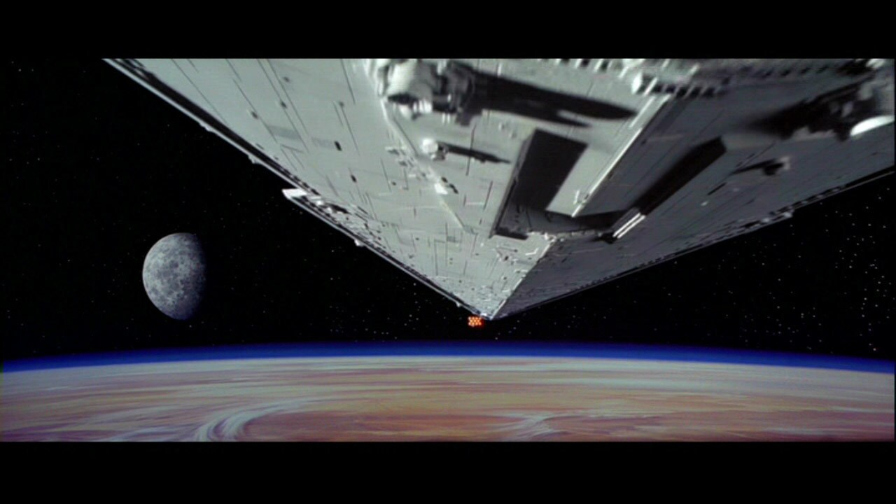 An Imperial Star Destroyer pursues Princess Leia's diplomatic consular ship. 
