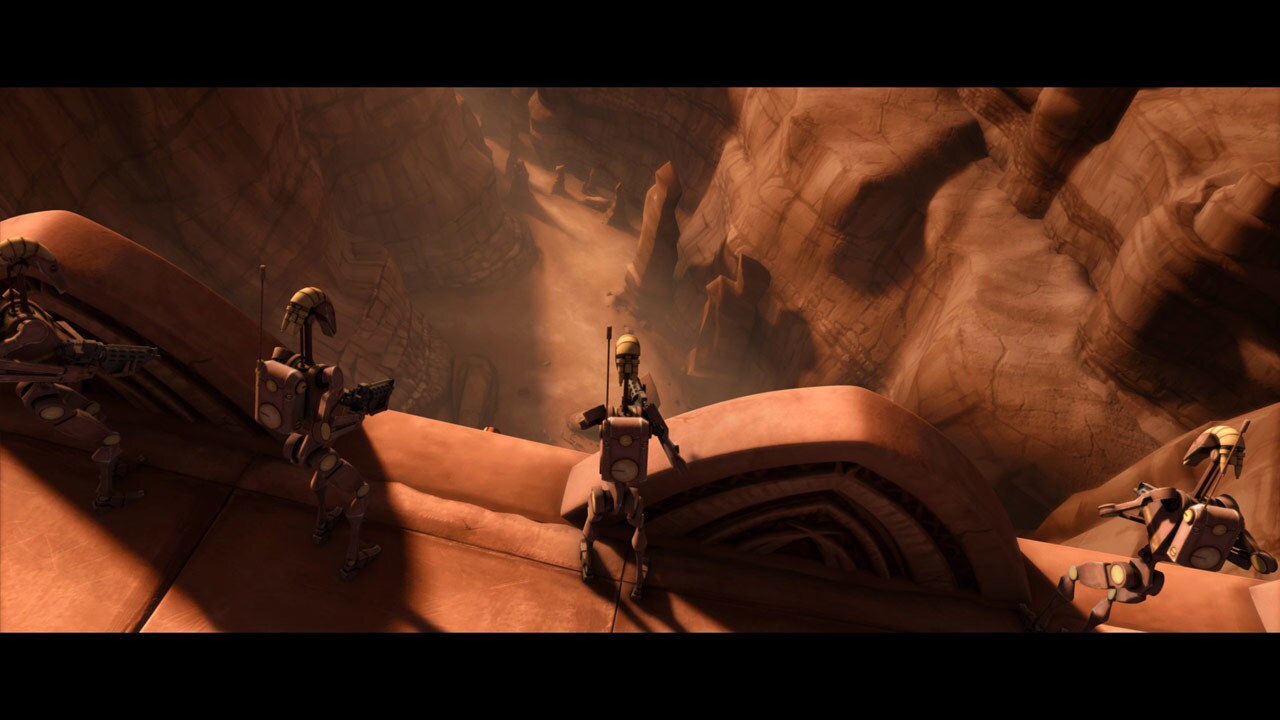 The armored wall looms large, cutting off progress through the canyon. It is lined with droid for...