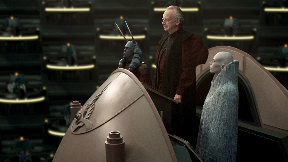 Palpatine and his entourage addressing the Galactic Senate