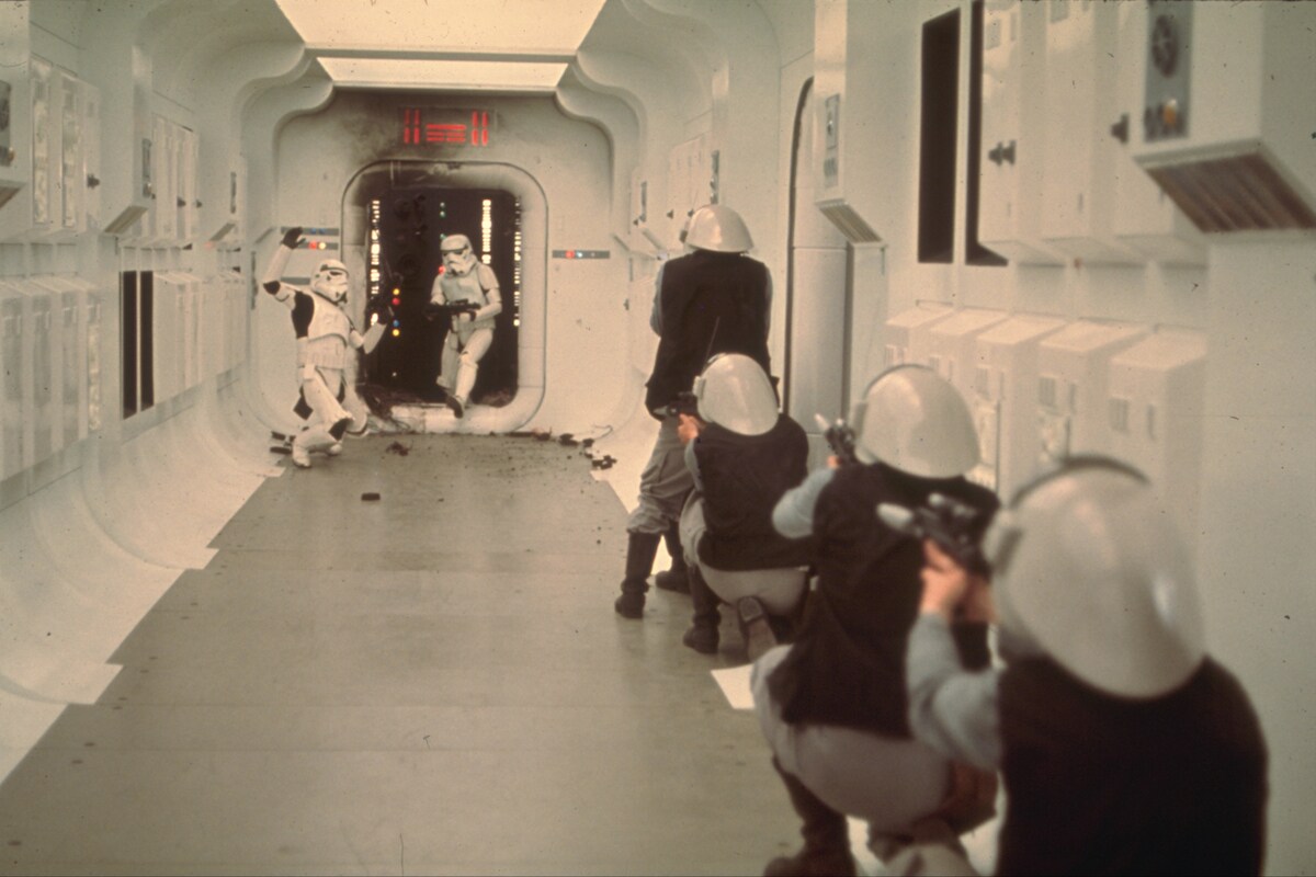 Rebel soldiers attempting to defend the Tantive IV against boarding Stormtroopers